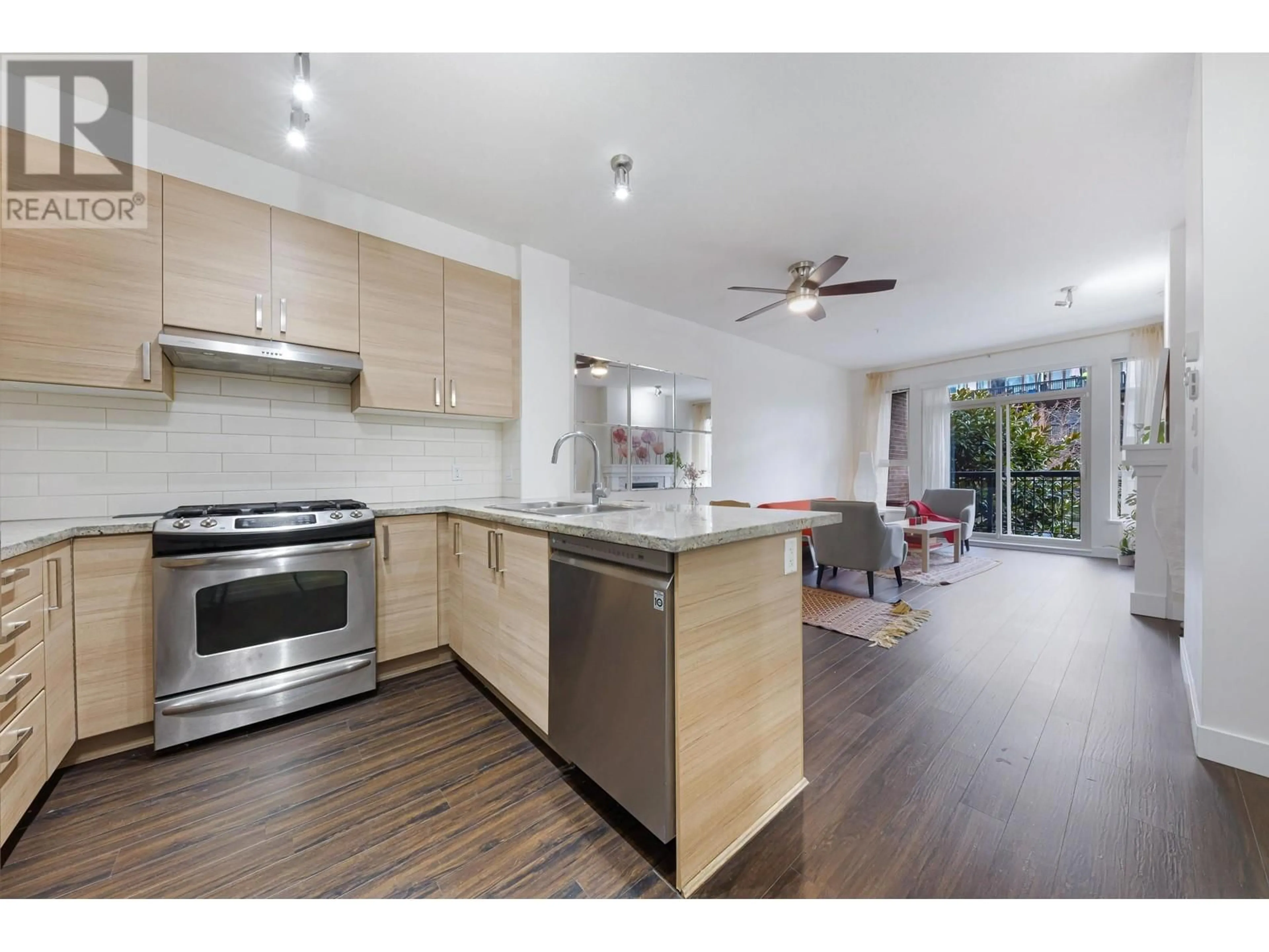 Open concept kitchen, wood/laminate floor for 212 - 1150 KENSAL PLACE, Coquitlam British Columbia V3B0H4