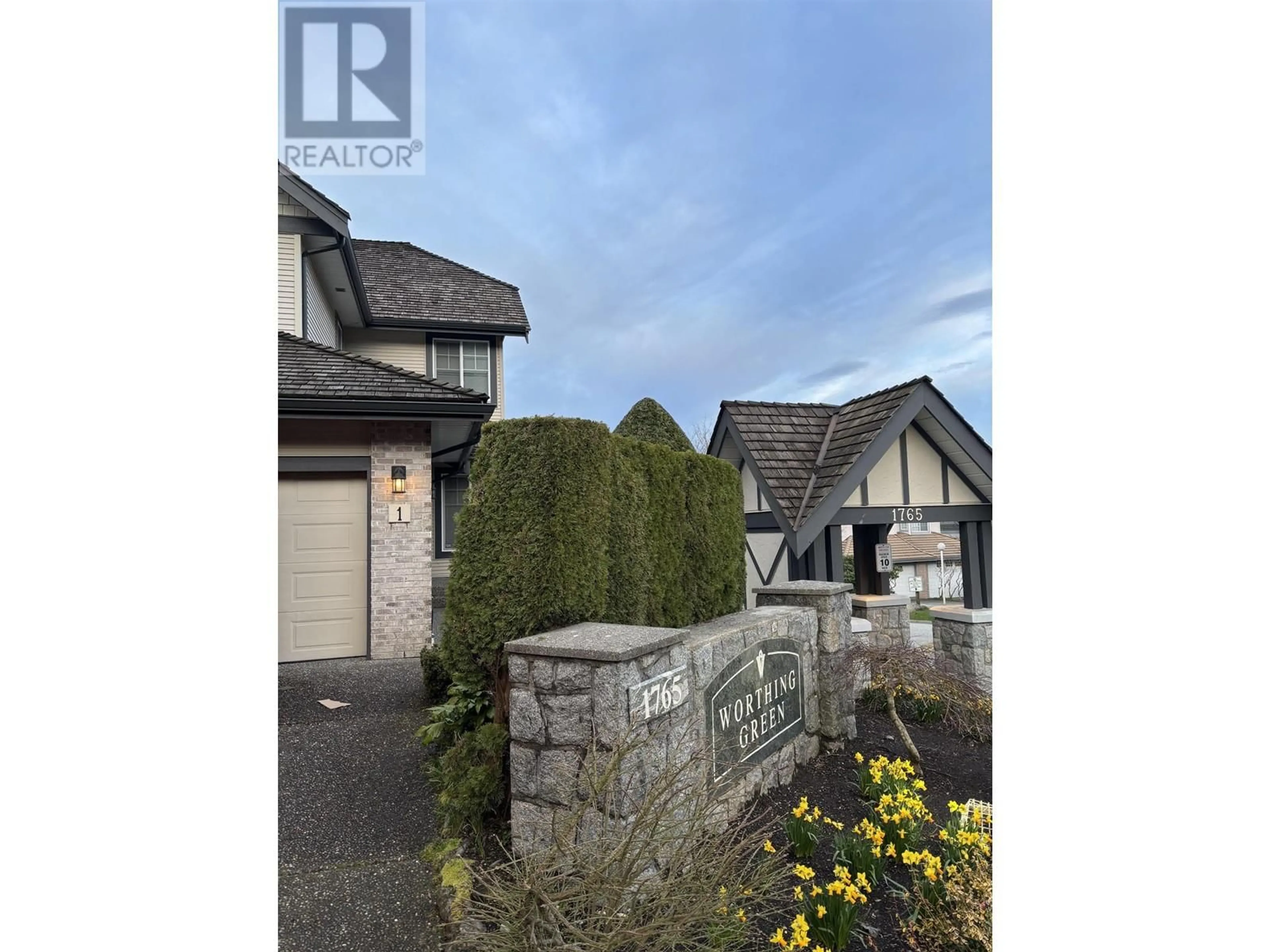 Home with vinyl exterior material, street for 1 - 1765 PADDOCK DRIVE, Coquitlam British Columbia V3E3J1