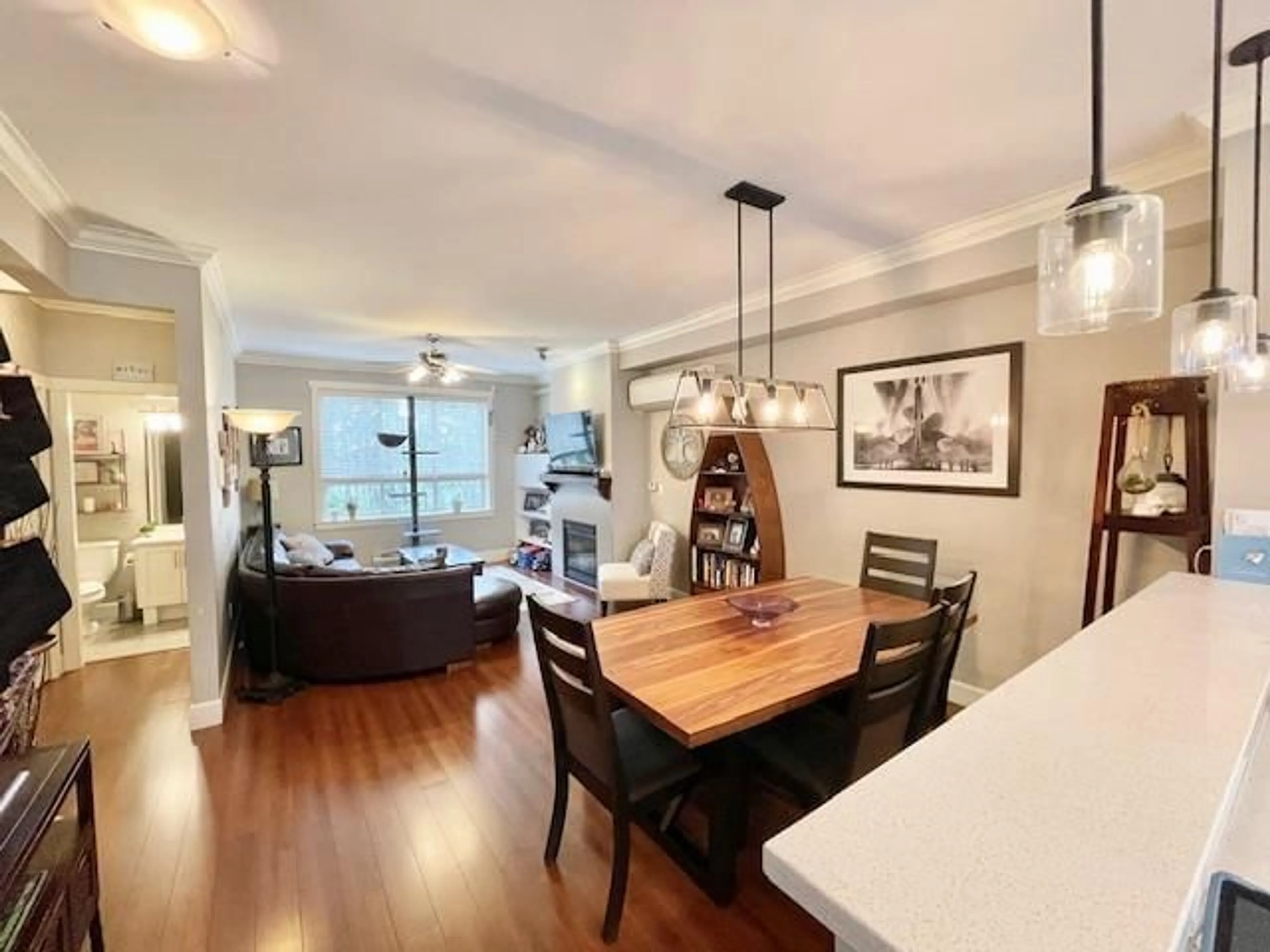 Dining room, wood/laminate floor for 25 - 19560 68, Surrey British Columbia V4N5Y5