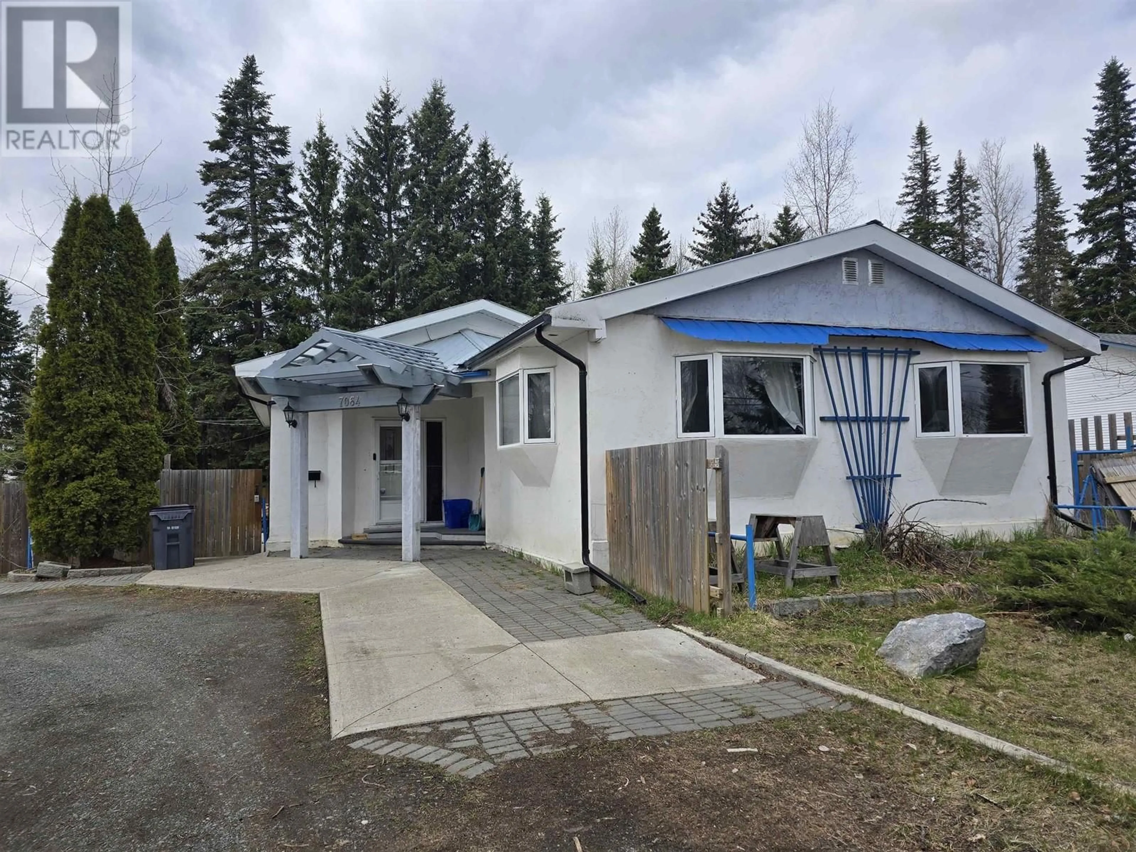 A pic from outside/outdoor area/front of a property/back of a property/a pic from drone, street for 7064 ADAM DRIVE, Prince George British Columbia V2K2M7