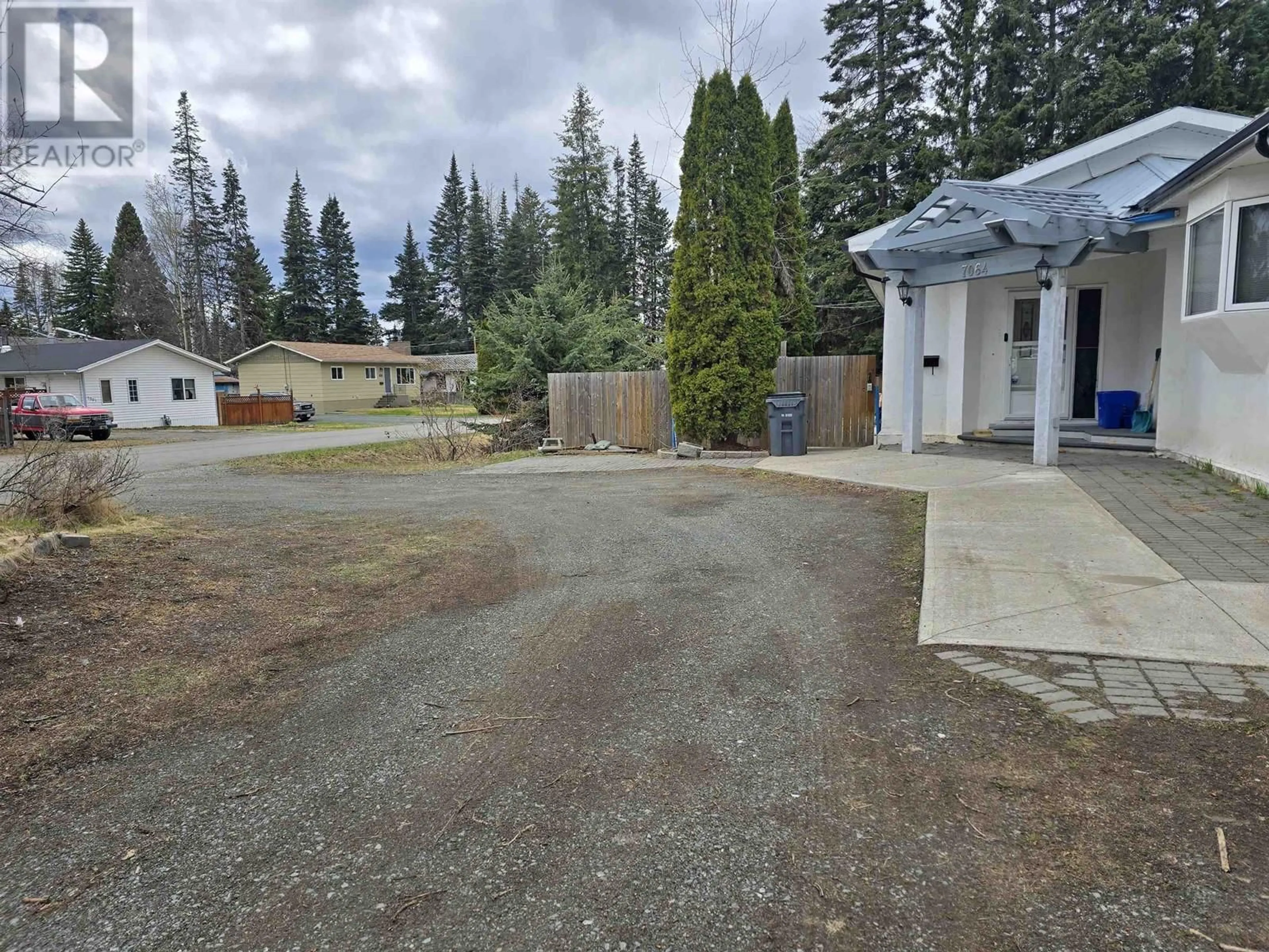 Home with vinyl exterior material, street for 7064 ADAM DRIVE, Prince George British Columbia V2K2M7