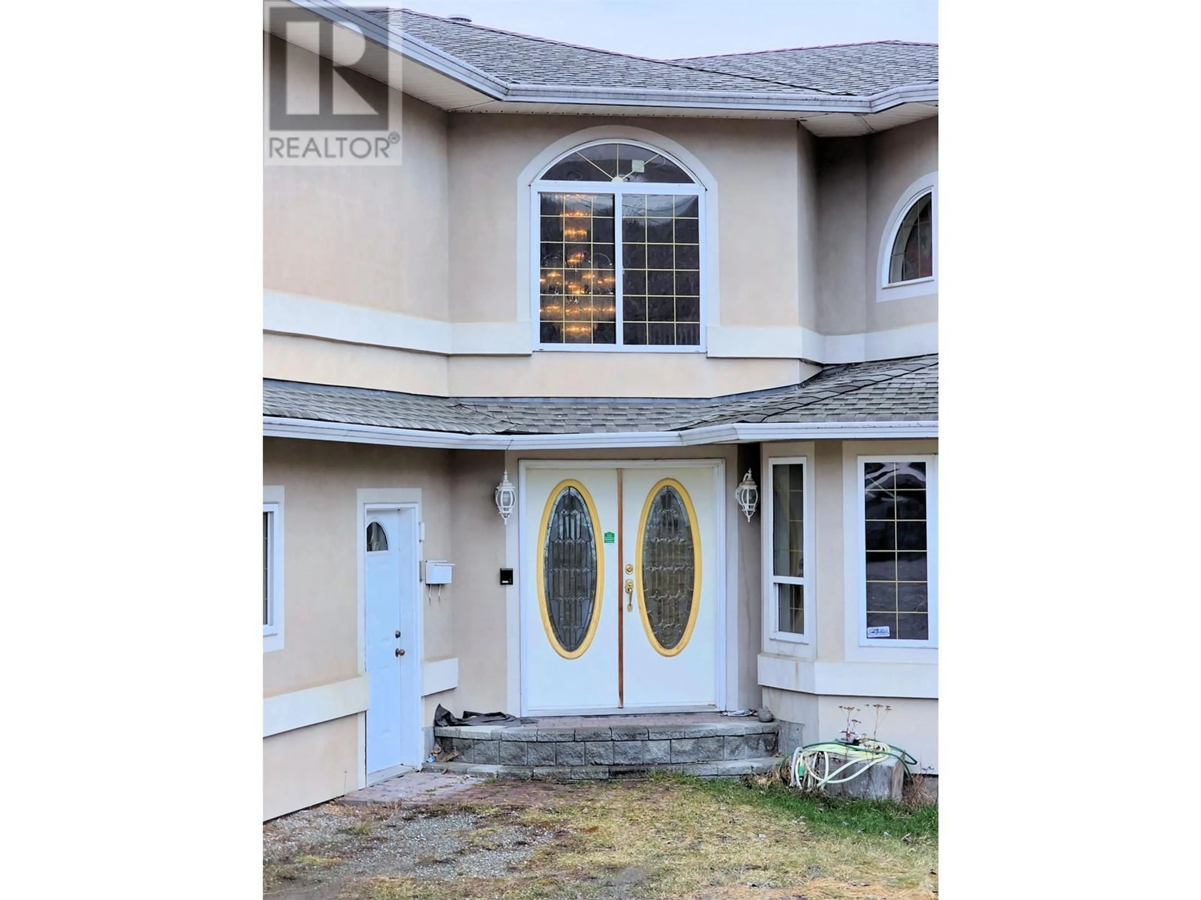 Home with vinyl exterior material, street for 166 BOUCHIE STREET, Quesnel British Columbia V2J1L8