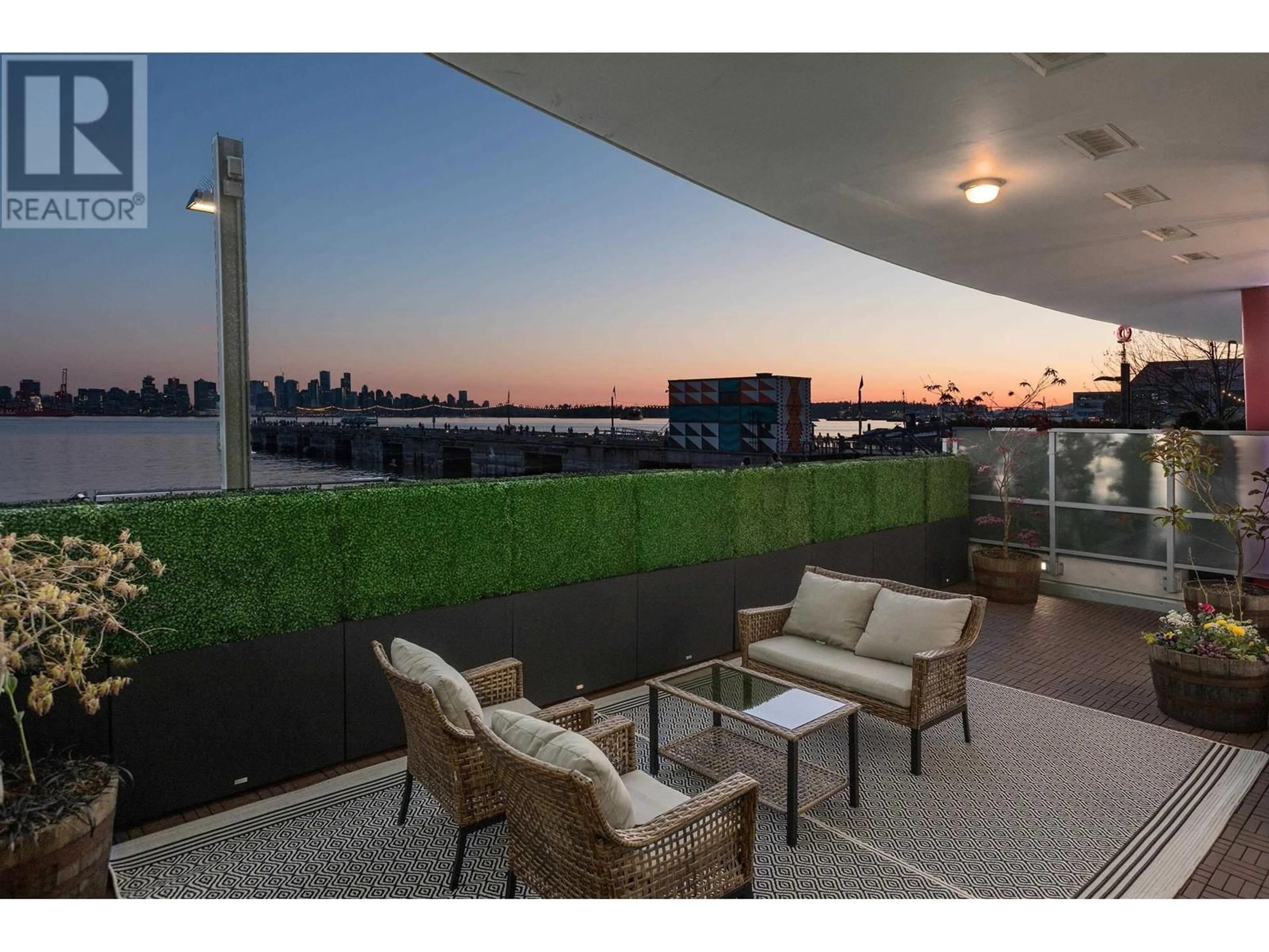 Patio, water/lake/river/ocean view for 105 - 175 VICTORY SHIP WAY, North Vancouver British Columbia V7L0G1