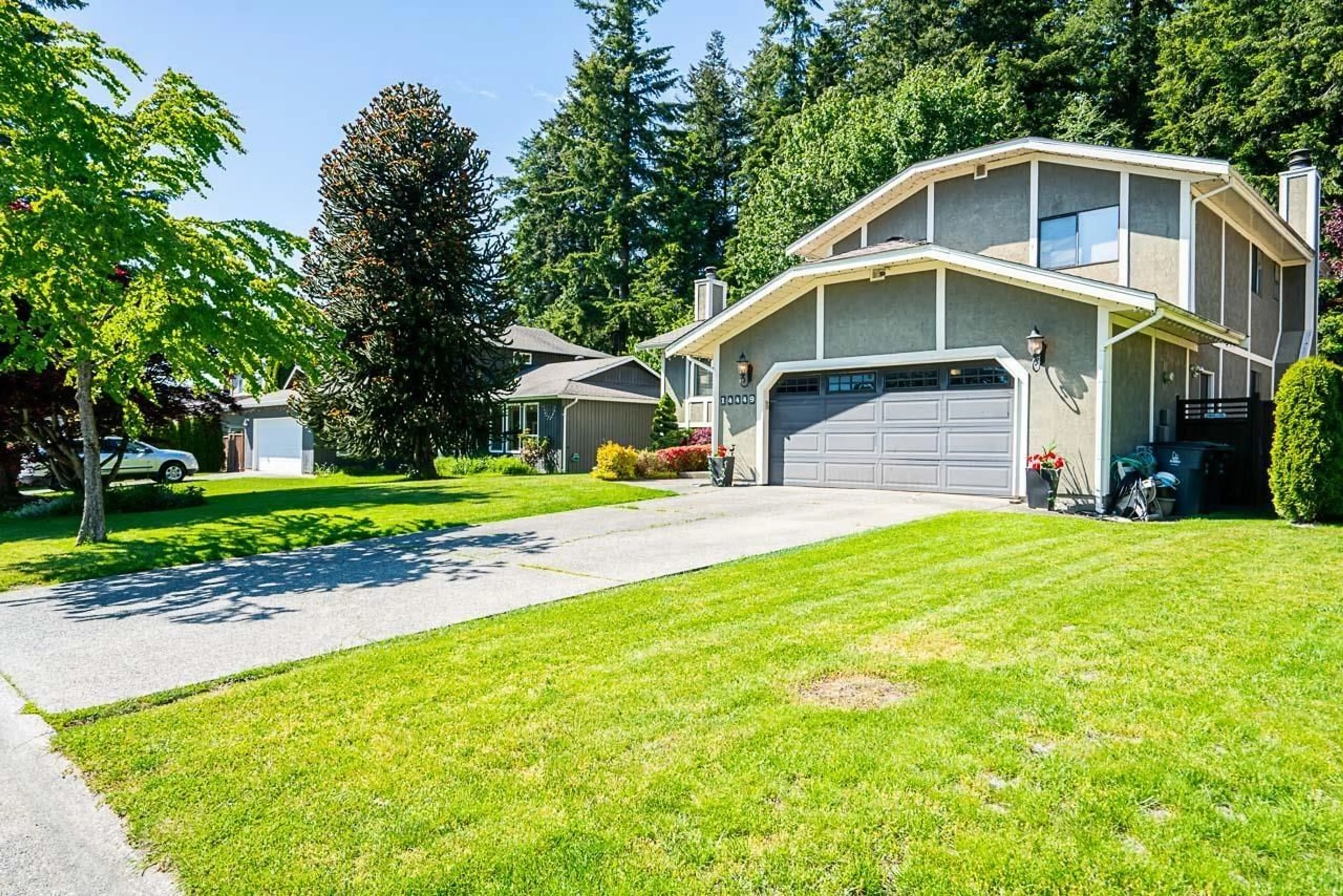 Home with vinyl exterior material, street for 14449 19A, Surrey British Columbia V4A6X3