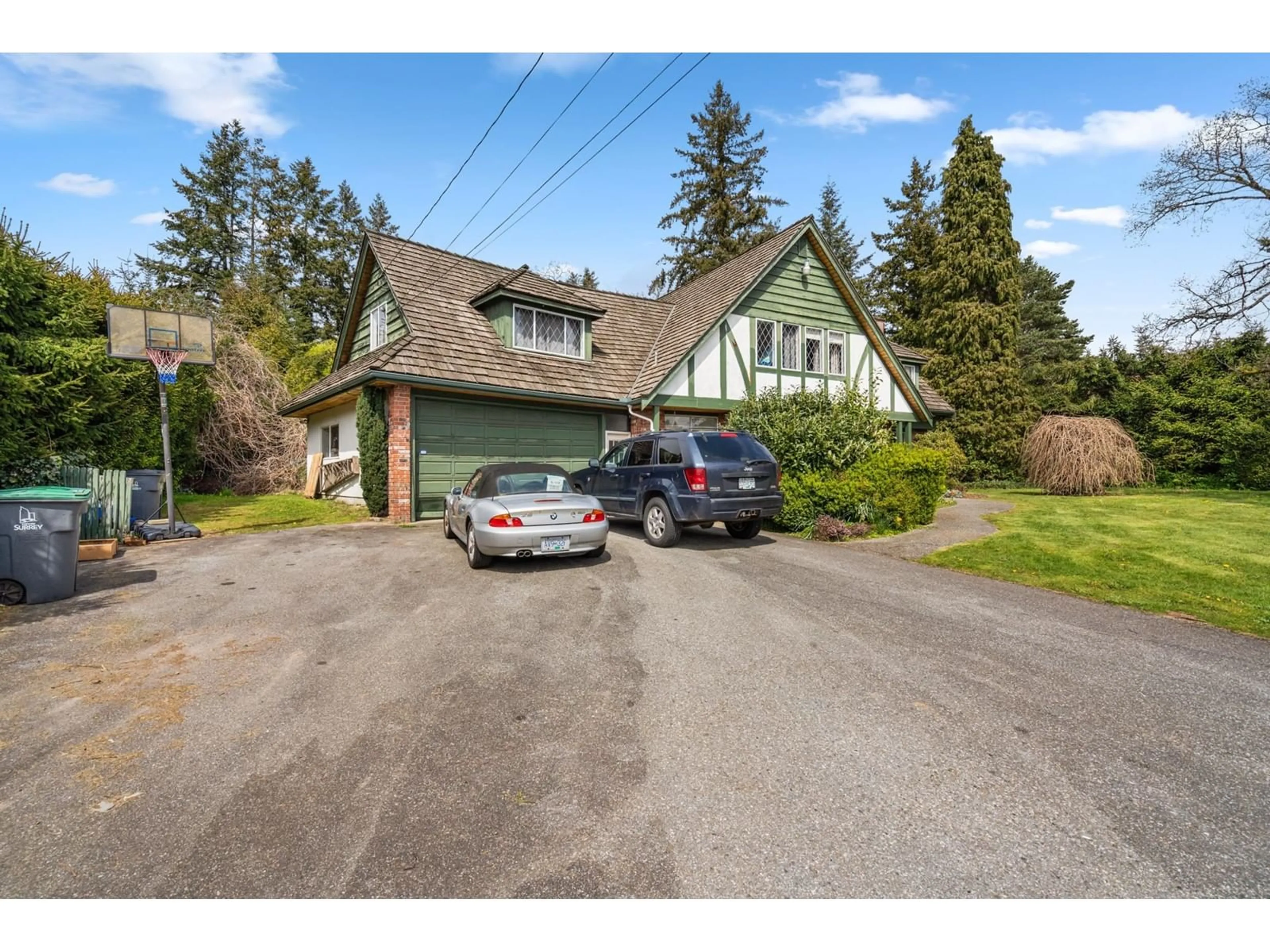 A pic from outside/outdoor area/front of a property/back of a property/a pic from drone, street for 14633 56, Surrey British Columbia V3S1B6