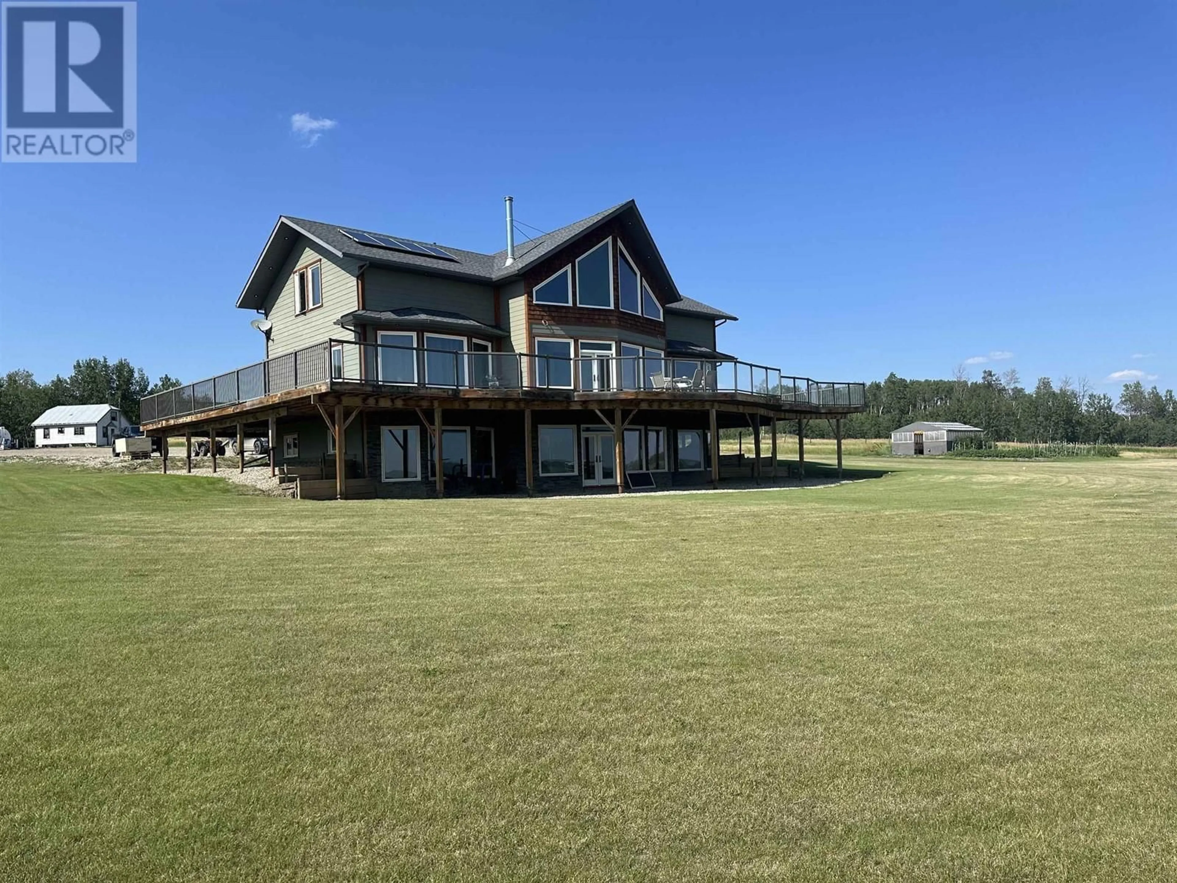 A pic from outside/outdoor area/front of a property/back of a property/a pic from drone, water/lake/river/ocean view for 16767 277 ROAD, Fort St. John British Columbia V0C1Y0