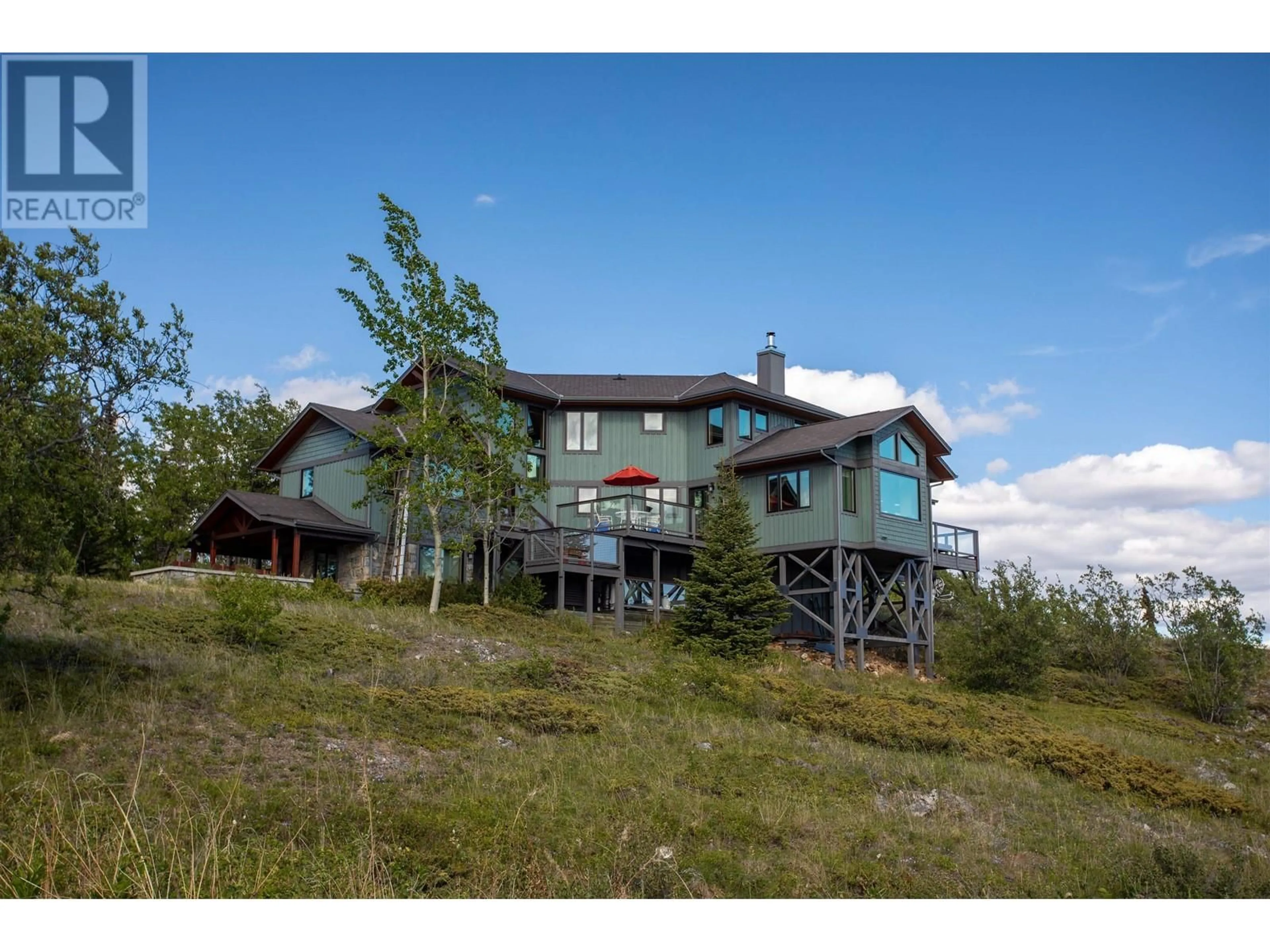 A pic from outside/outdoor area/front of a property/back of a property/a pic from drone, mountain view for 1 MOOSE HILL ROAD, Atlin British Columbia V0W1A0
