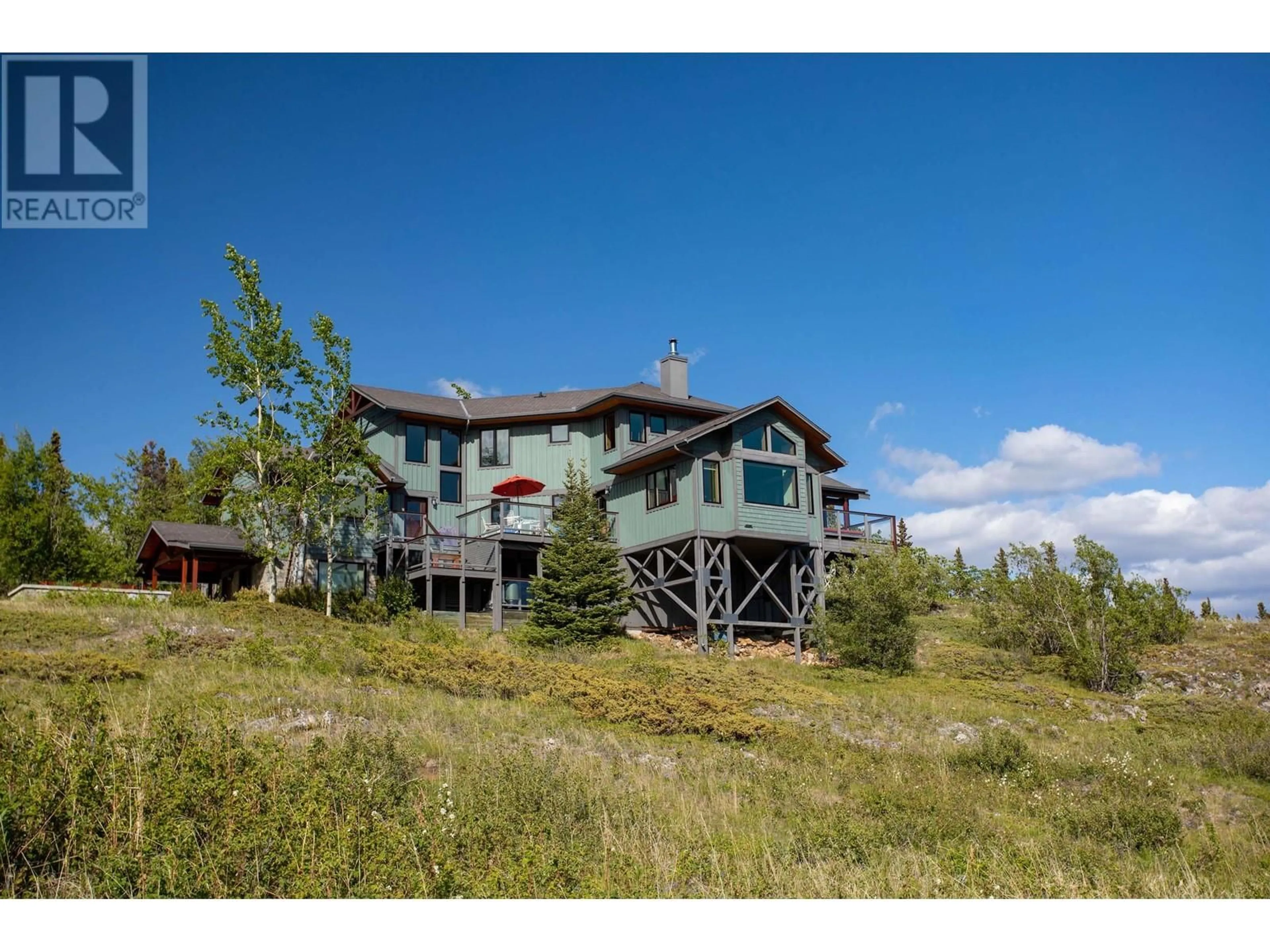 A pic from outside/outdoor area/front of a property/back of a property/a pic from drone, unknown for 1 MOOSE HILL ROAD, Atlin British Columbia V0W1A0