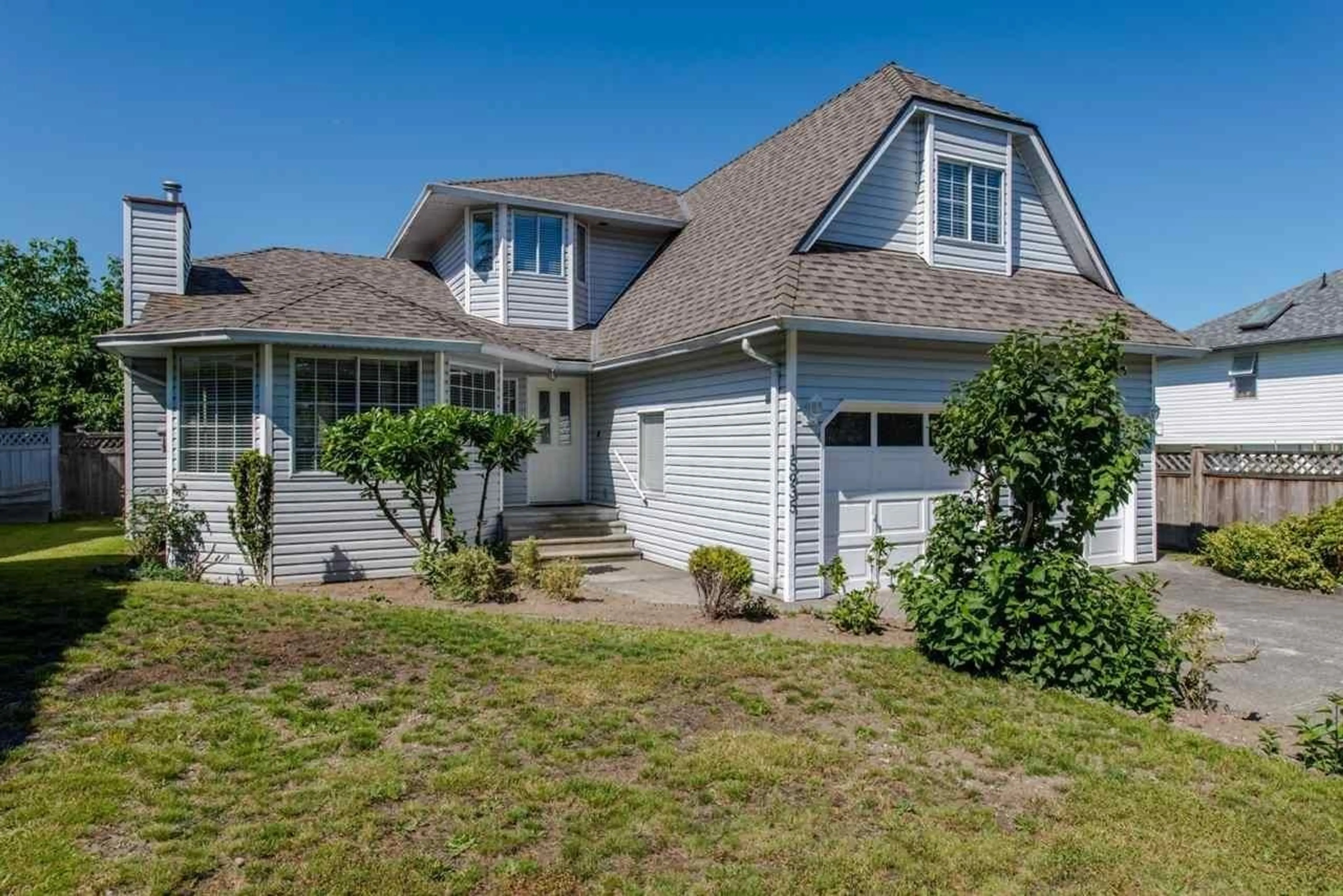 Home with vinyl exterior material, street for 15935 88A, Surrey British Columbia V4N2X9