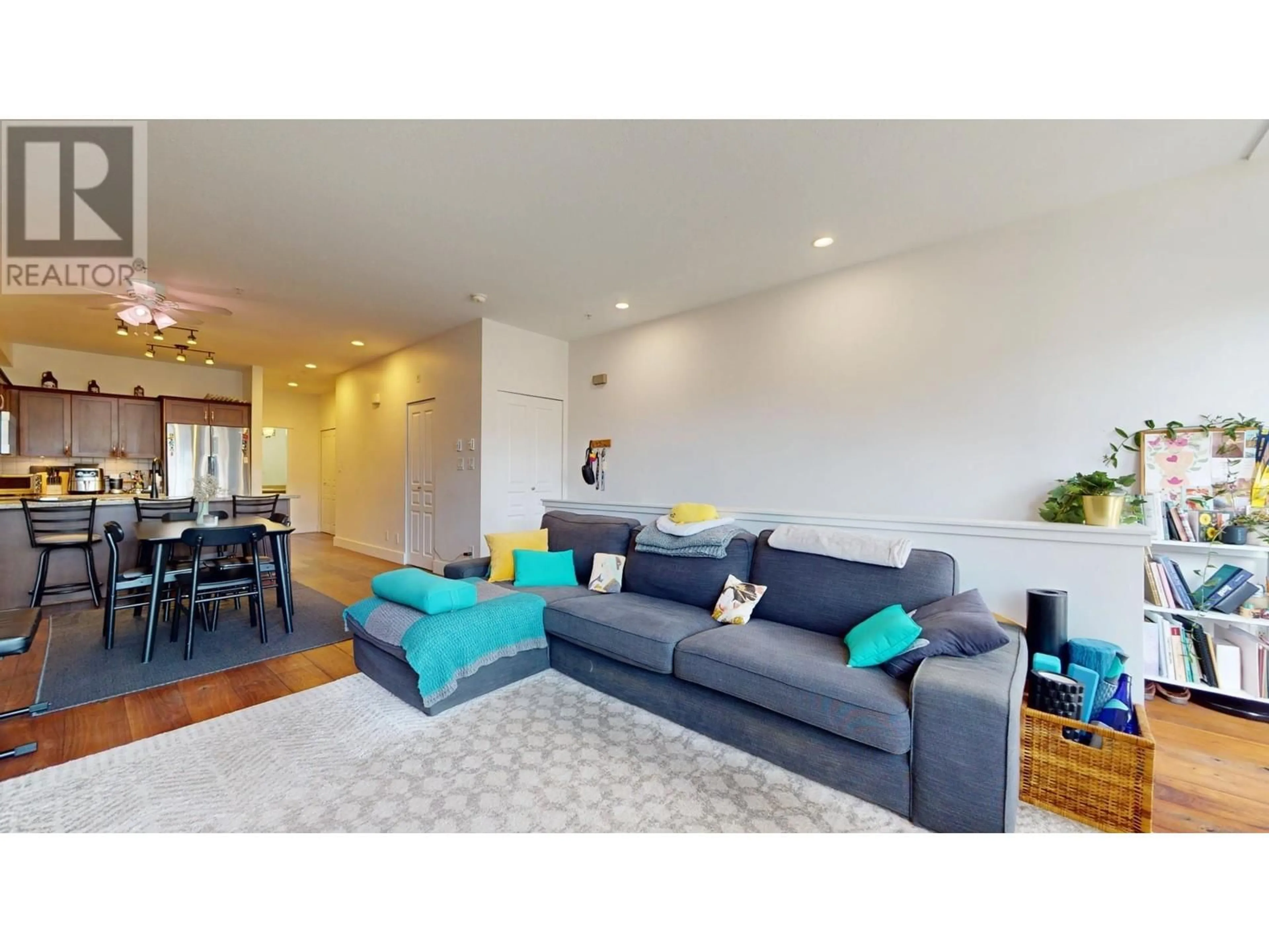 Living room with furniture, wood/laminate floor for 1308 MAIN STREET, Squamish British Columbia V8B0R2