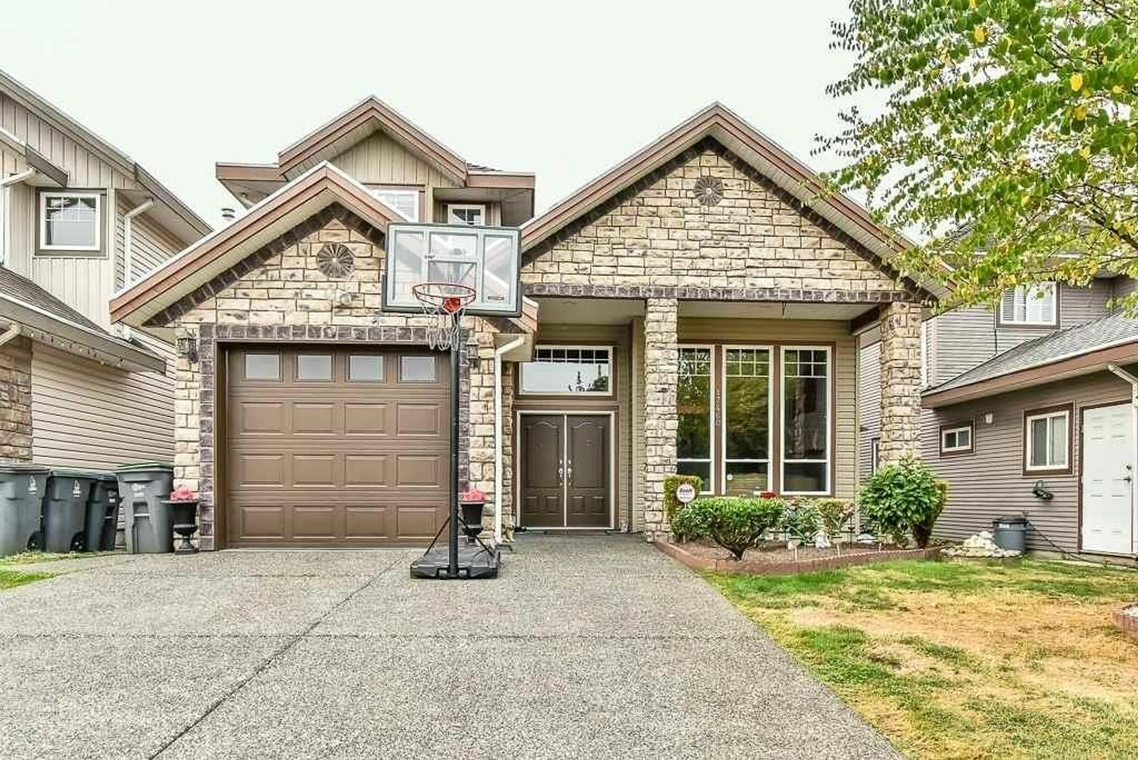 Home with brick exterior material, street for 17460 64A, Surrey British Columbia V3S3K9