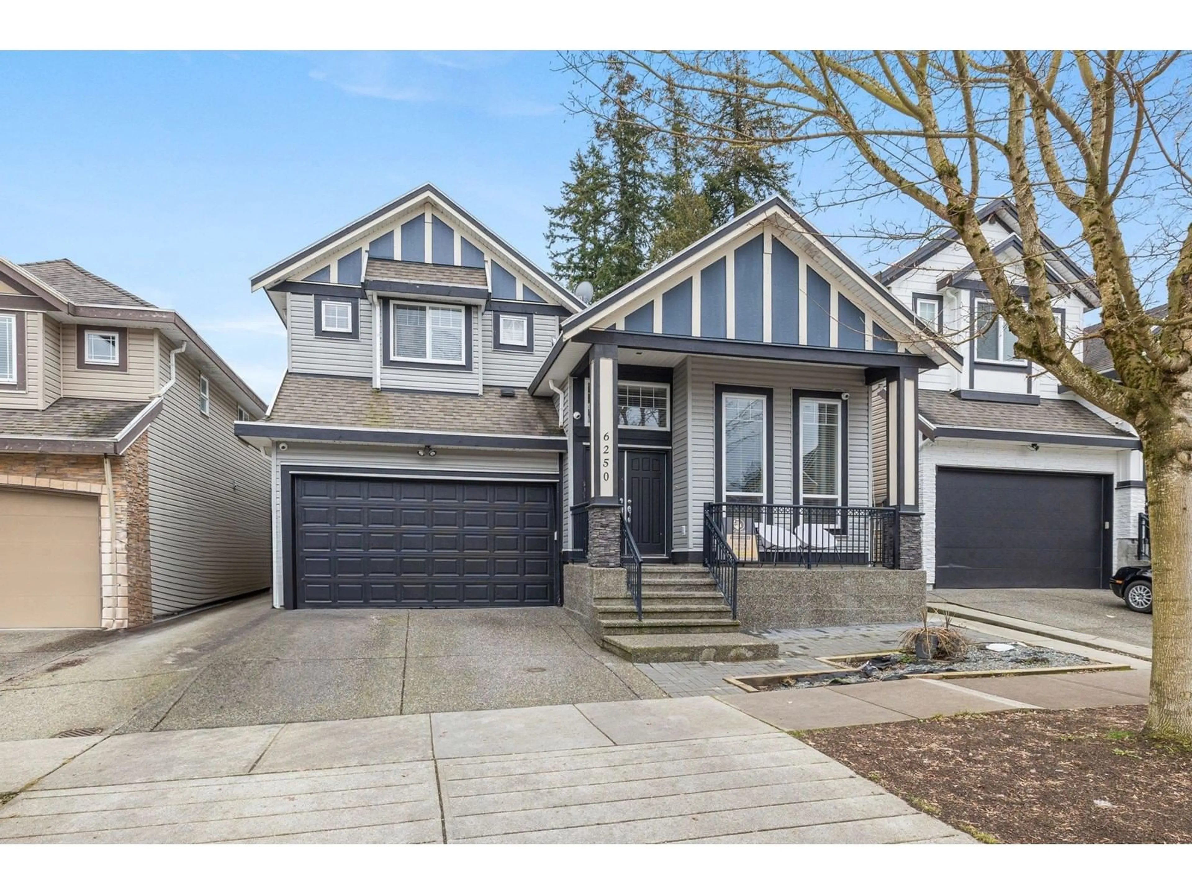 Home with vinyl exterior material, street for 6250 142B, Surrey British Columbia V3X0B7