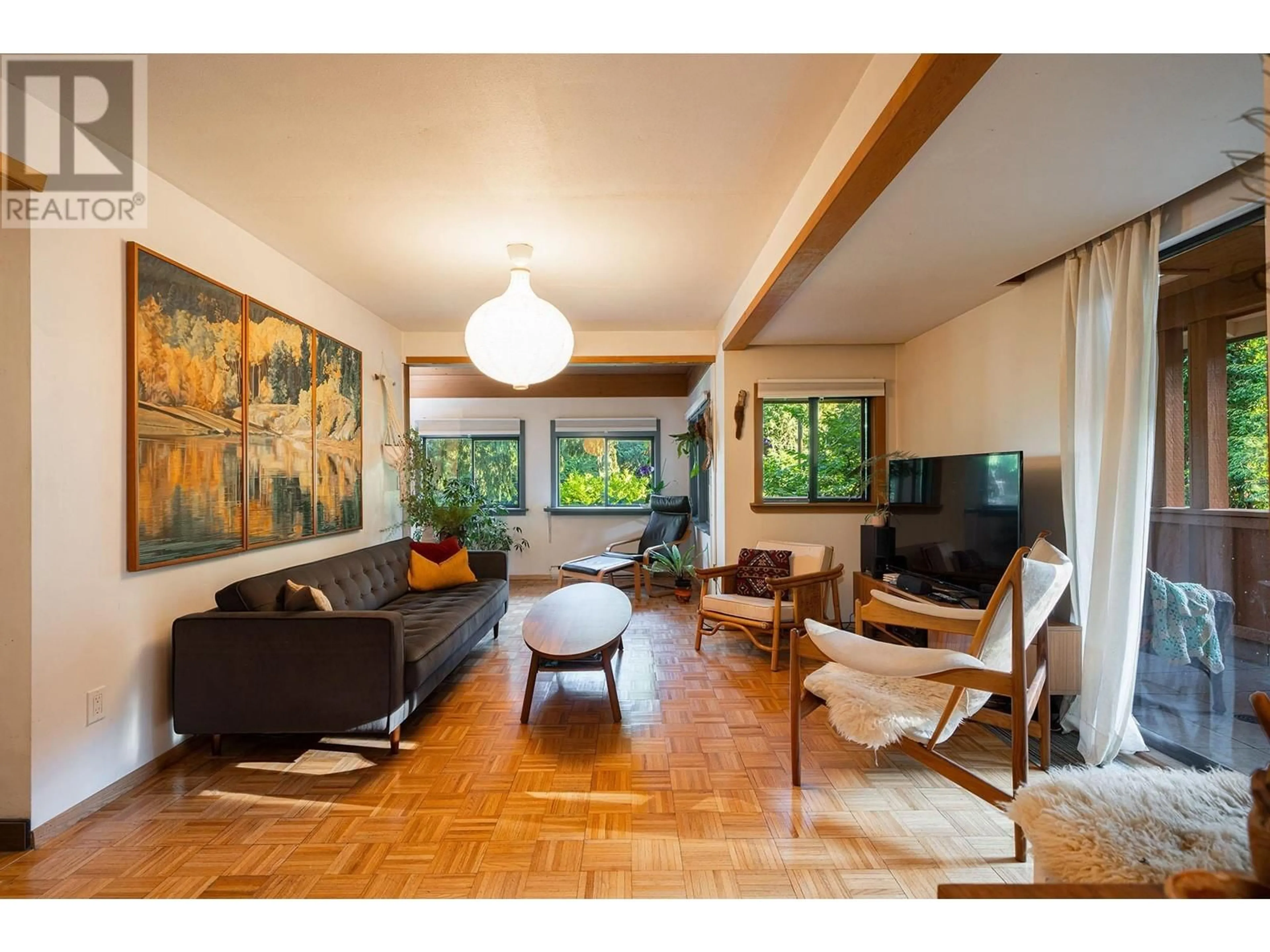 Living room with furniture, wood/laminate floor for 1142 MILLER ROAD, Bowen Island British Columbia V0N1G1