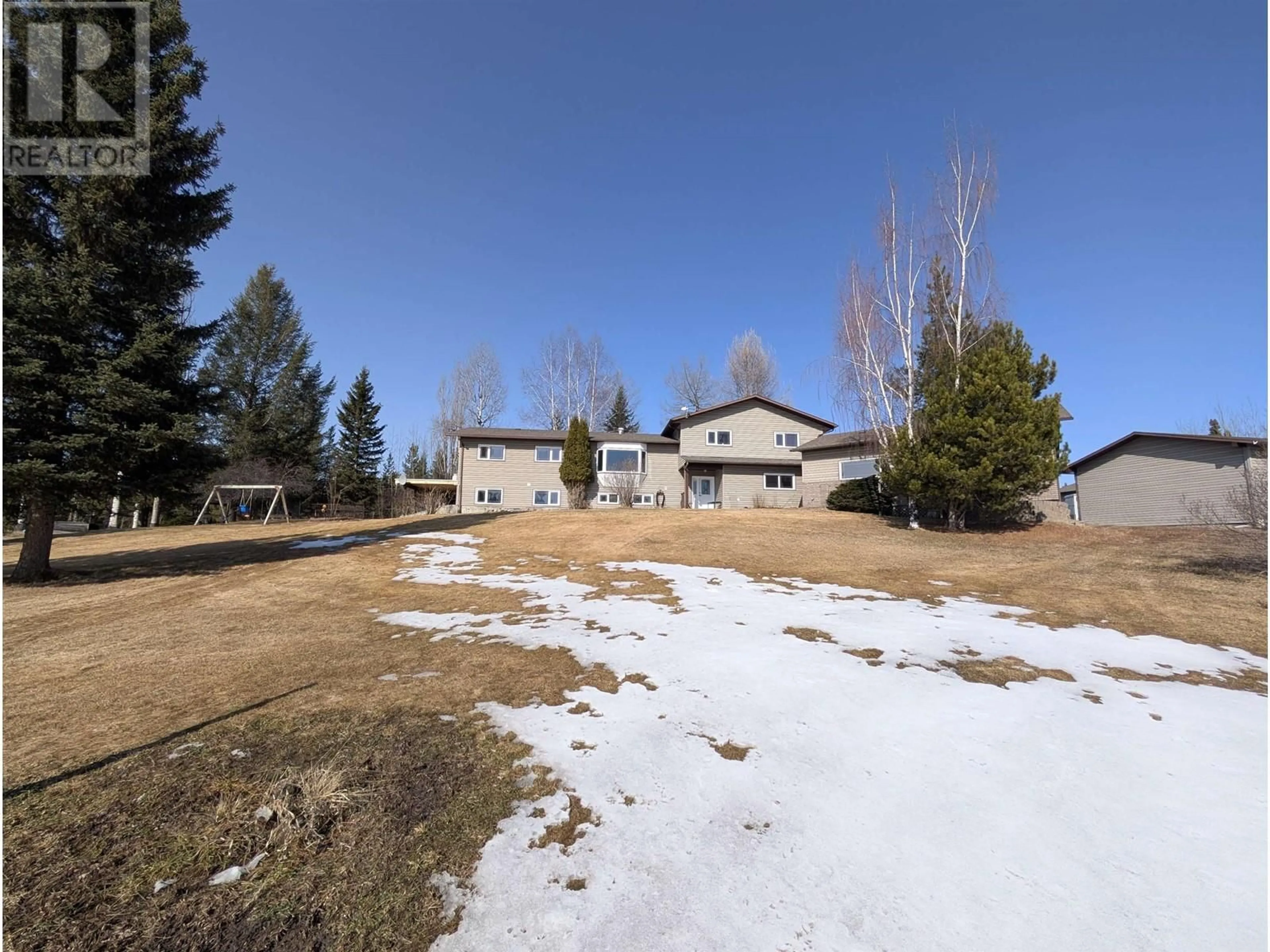 A pic from outside/outdoor area/front of a property/back of a property/a pic from drone, unknown for 11400 MAURAEN DRIVE, Prince George British Columbia V2N5B7