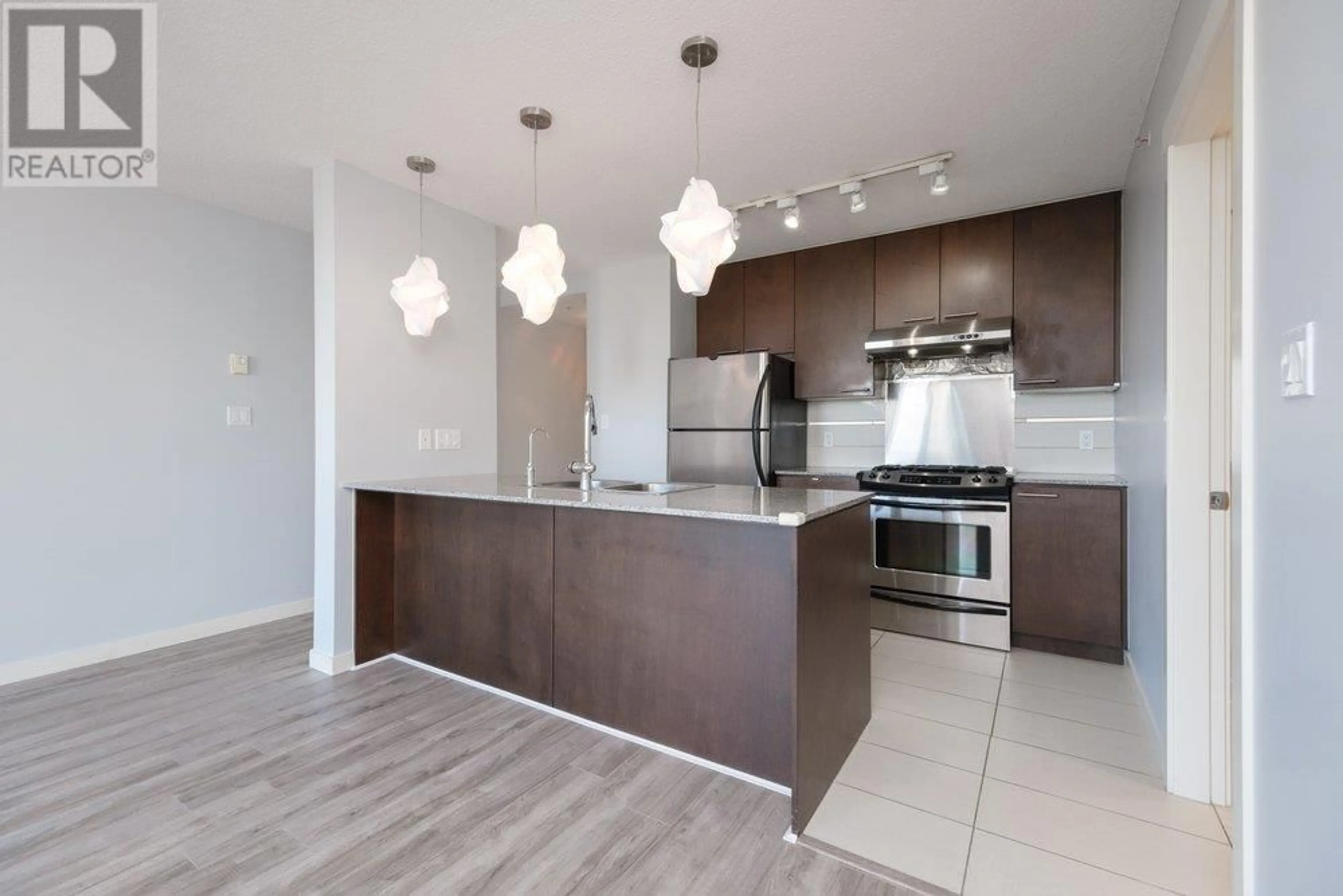Open concept kitchen, unknown for 713 - 5811 NO. 3 ROAD, Richmond British Columbia V6X4L7