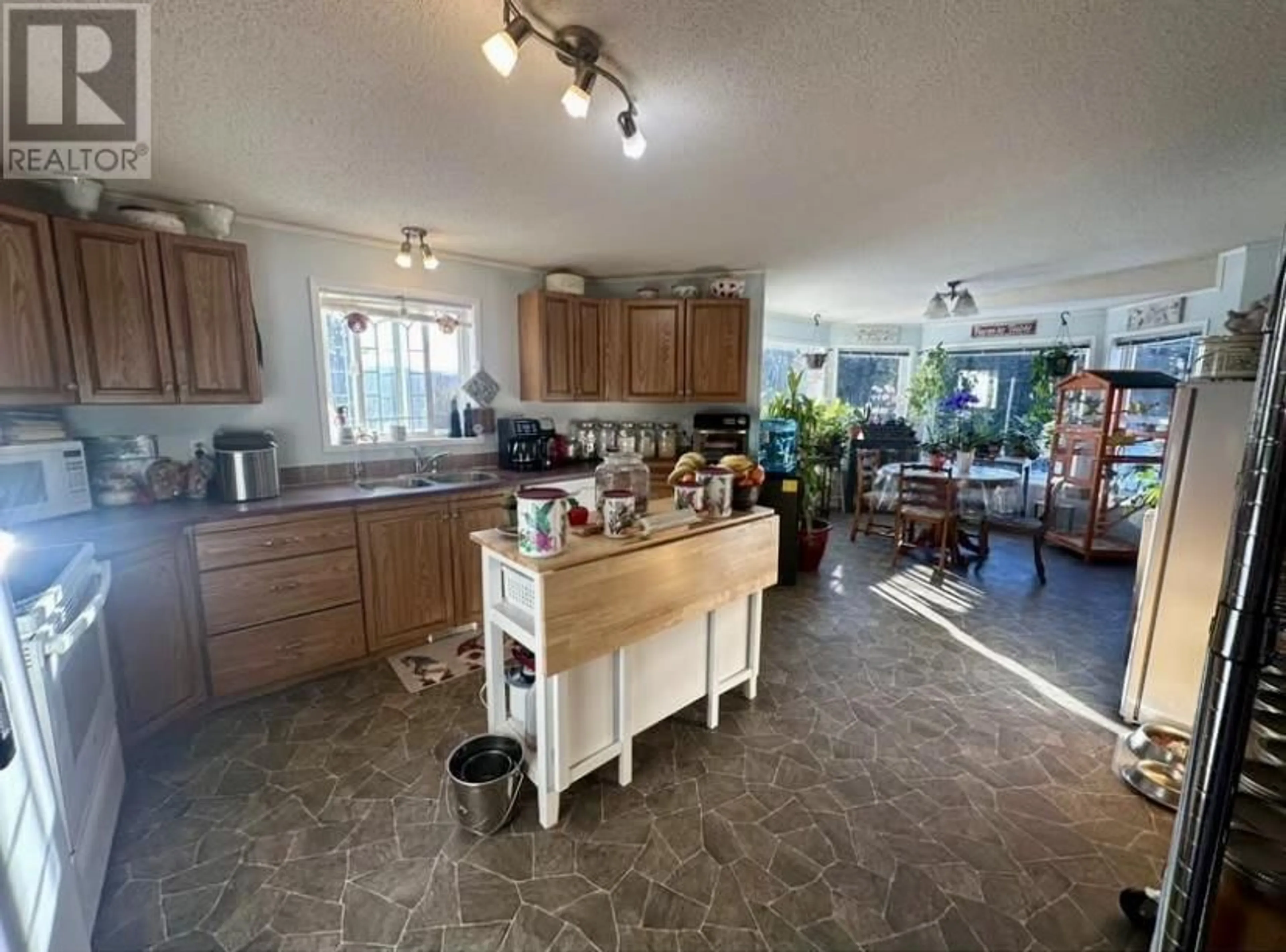 Open concept kitchen, ceramic/tile floor for 11834 WATSON PLACE, Topley British Columbia V0J2Y0