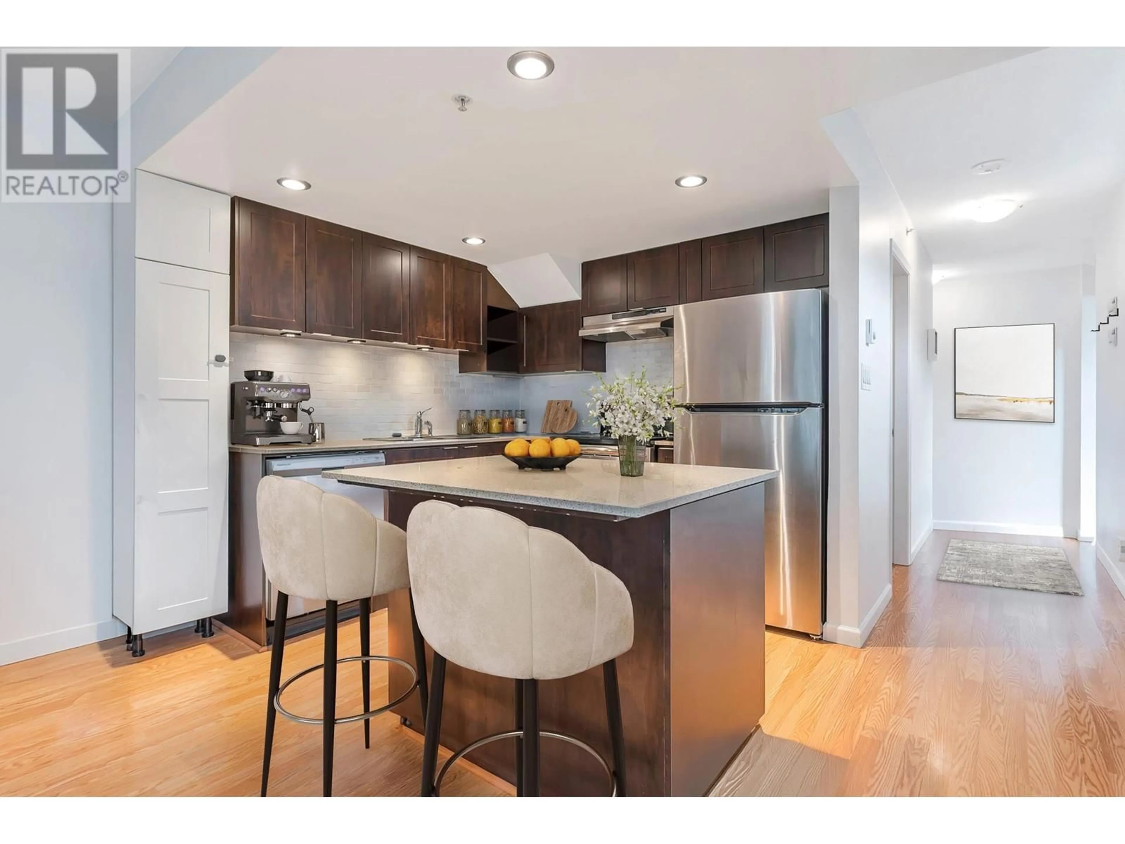 Open concept kitchen, wood/laminate floor for 9234 UNIVERSITY CRESCENT, Burnaby British Columbia V5A0A3