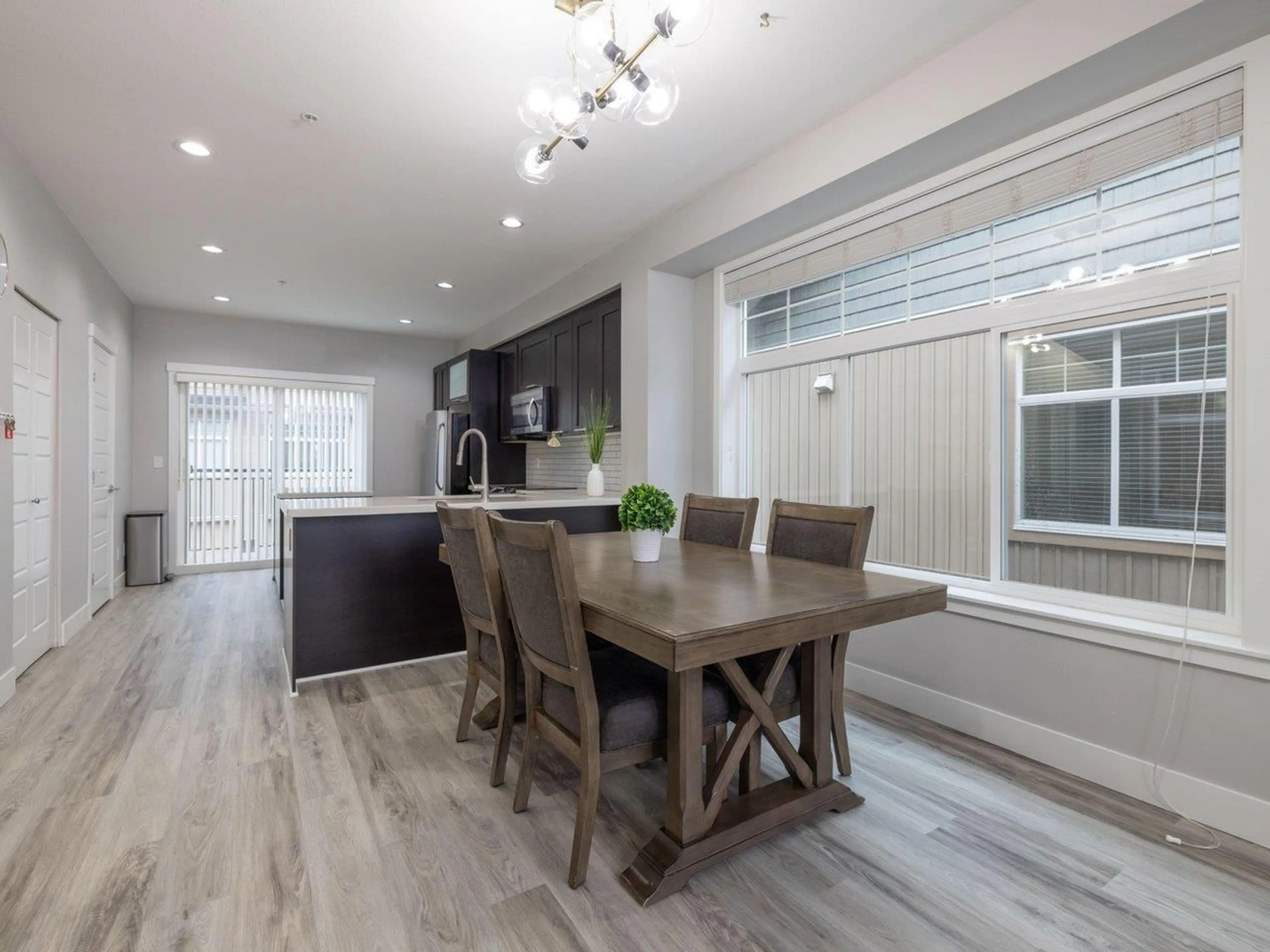 Open concept kitchen, wood/laminate floor for 42 - 20966 77A, Langley British Columbia V2Y0K9