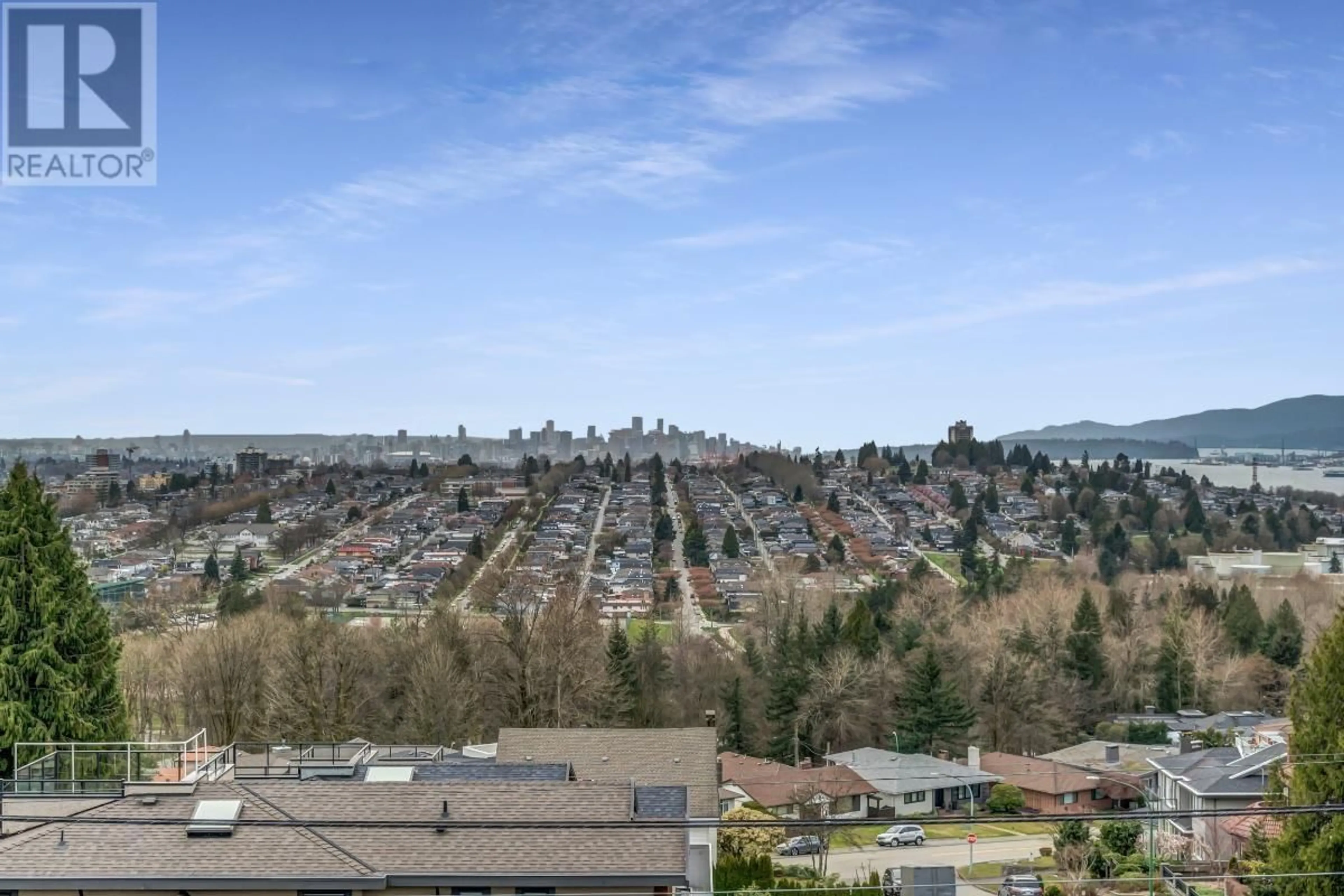 A pic from outside/outdoor area/front of a property/back of a property/a pic from drone, mountain view for 100 DELTA AVENUE, Burnaby British Columbia V5B1E6