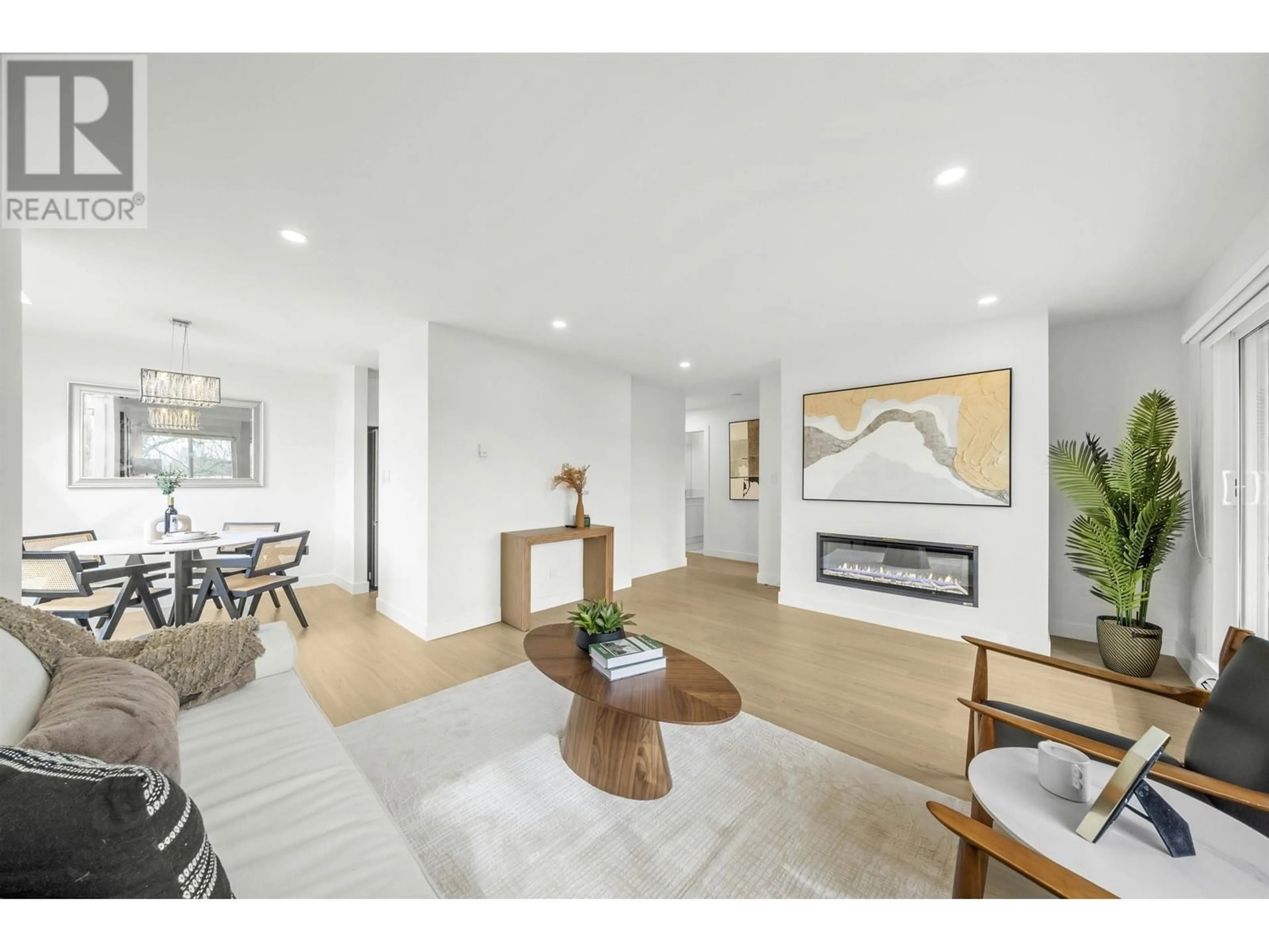 Living room with furniture, wood/laminate floor for 316 - 8591 WESTMINSTER HIGHWAY, Richmond British Columbia V6X3E2