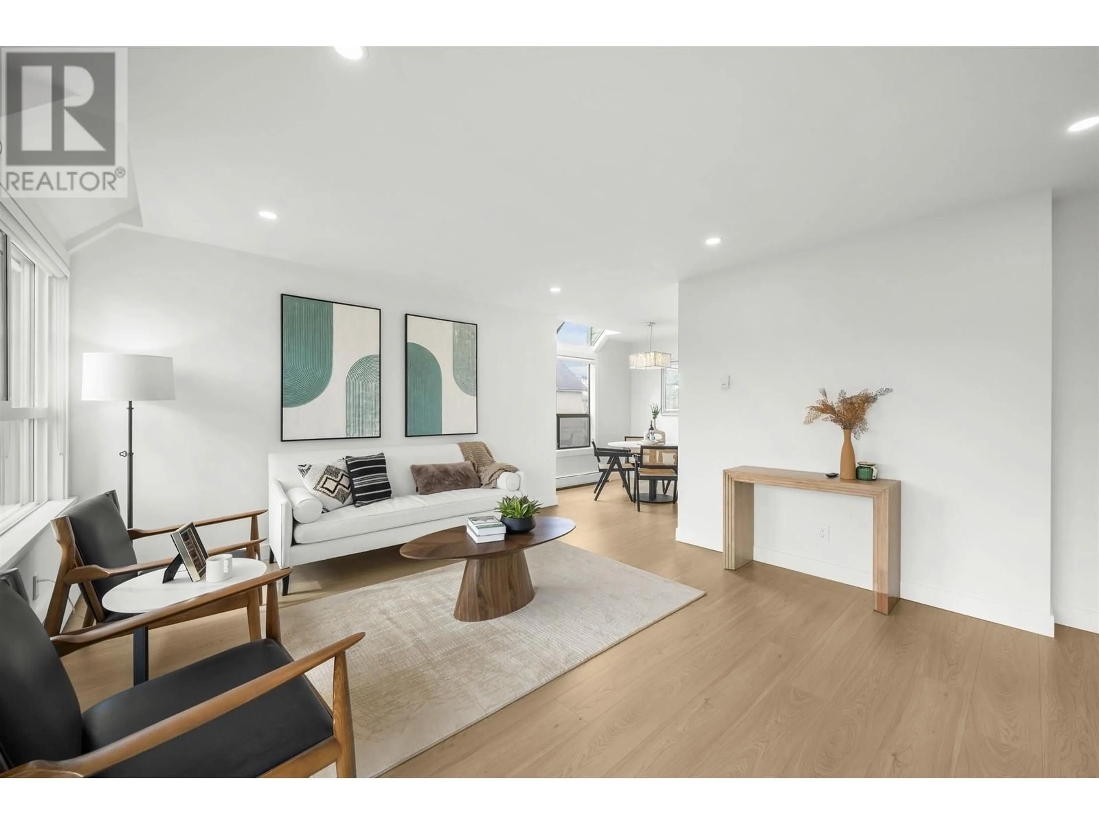Living room with furniture, wood/laminate floor for 316 - 8591 WESTMINSTER HIGHWAY, Richmond British Columbia V6X3E2