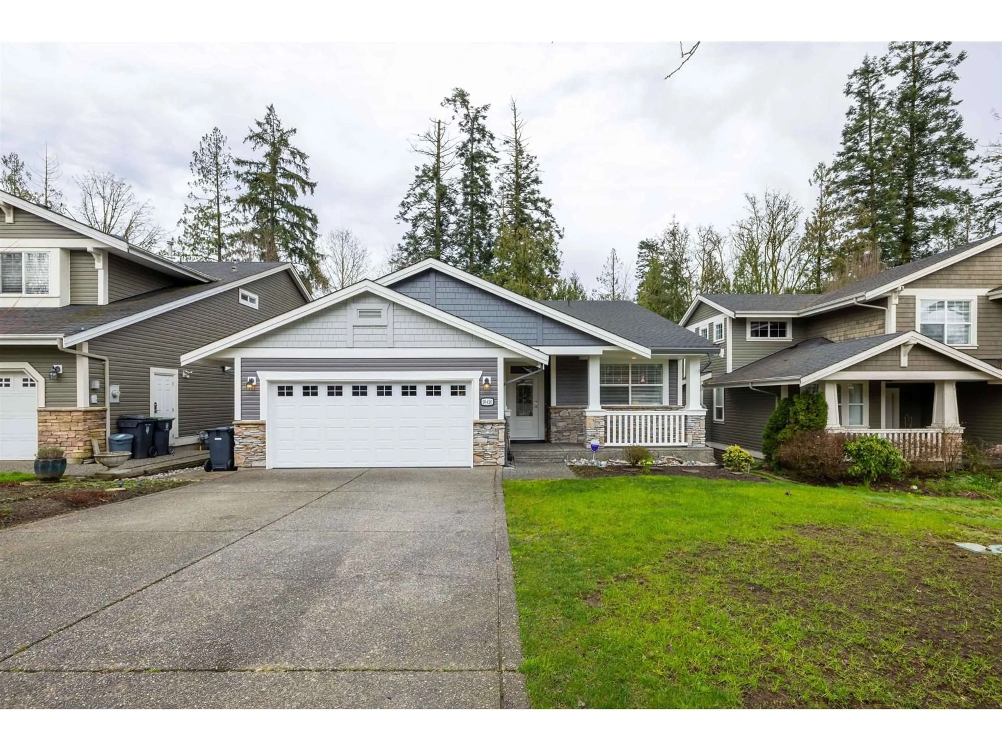 Home with vinyl exterior material, street for 20426 67A, Langley British Columbia V2Y2X5