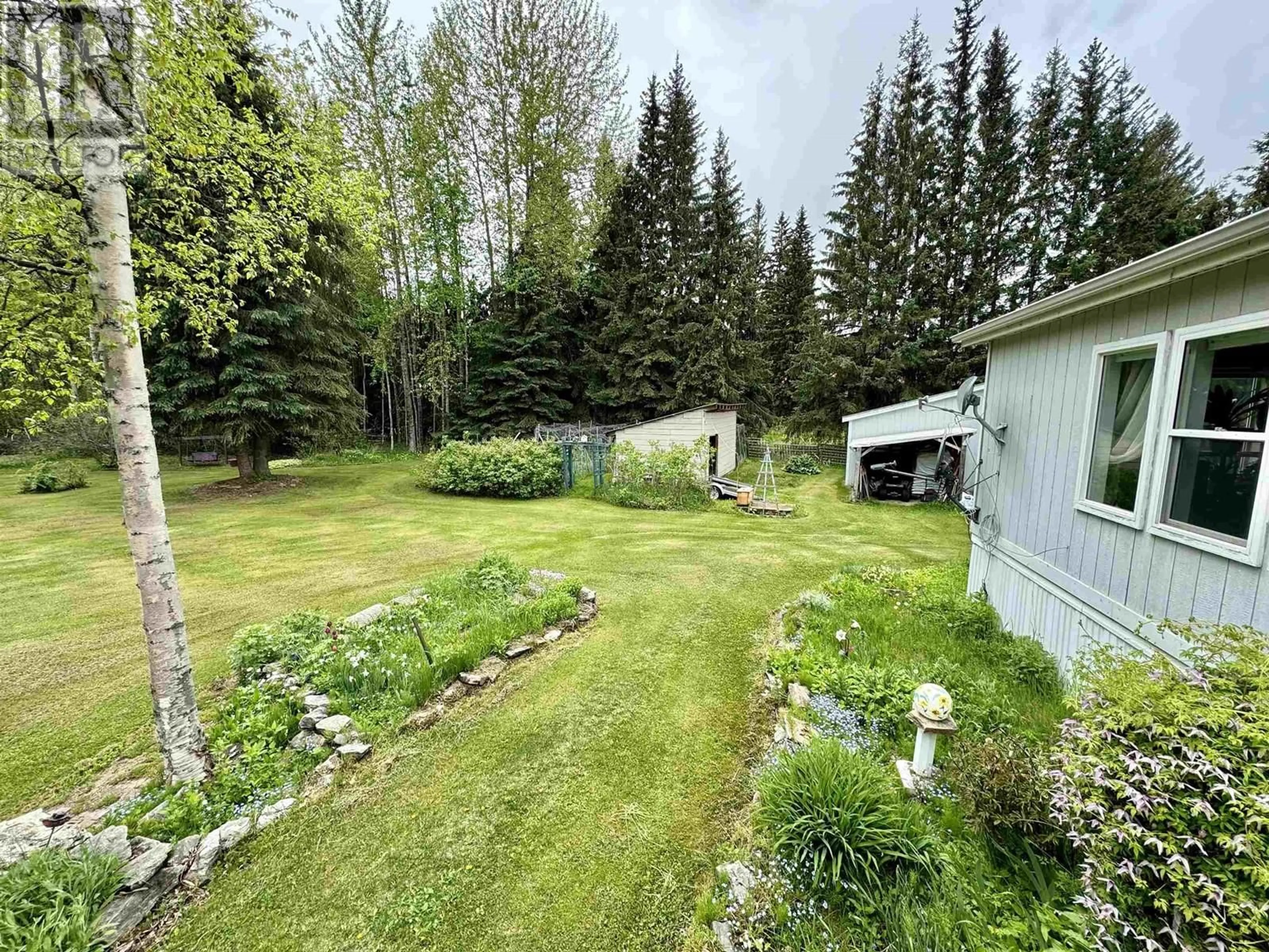 A pic from outside/outdoor area/front of a property/back of a property/a pic from drone, forest/trees view for 1680 DORVAL ROAD, McBride British Columbia V0J2E0