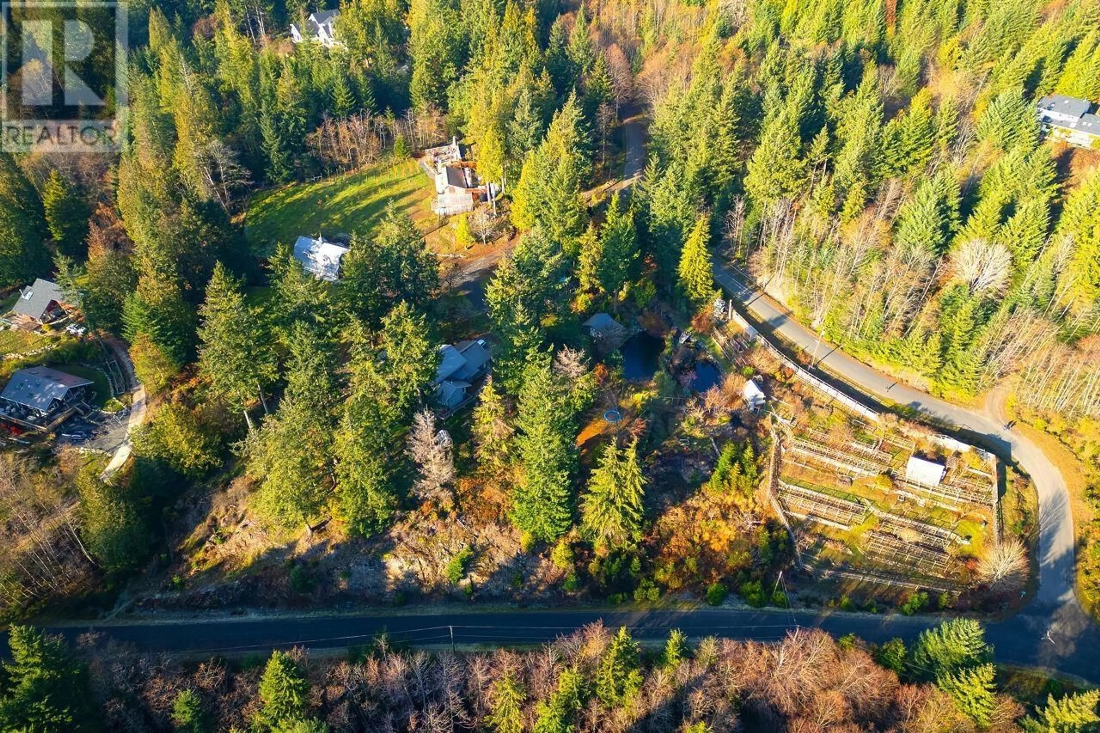 A pic from outside/outdoor area/front of a property/back of a property/a pic from drone, forest/trees view for 620 LAURA ROAD, Bowen Island British Columbia V0N1G2