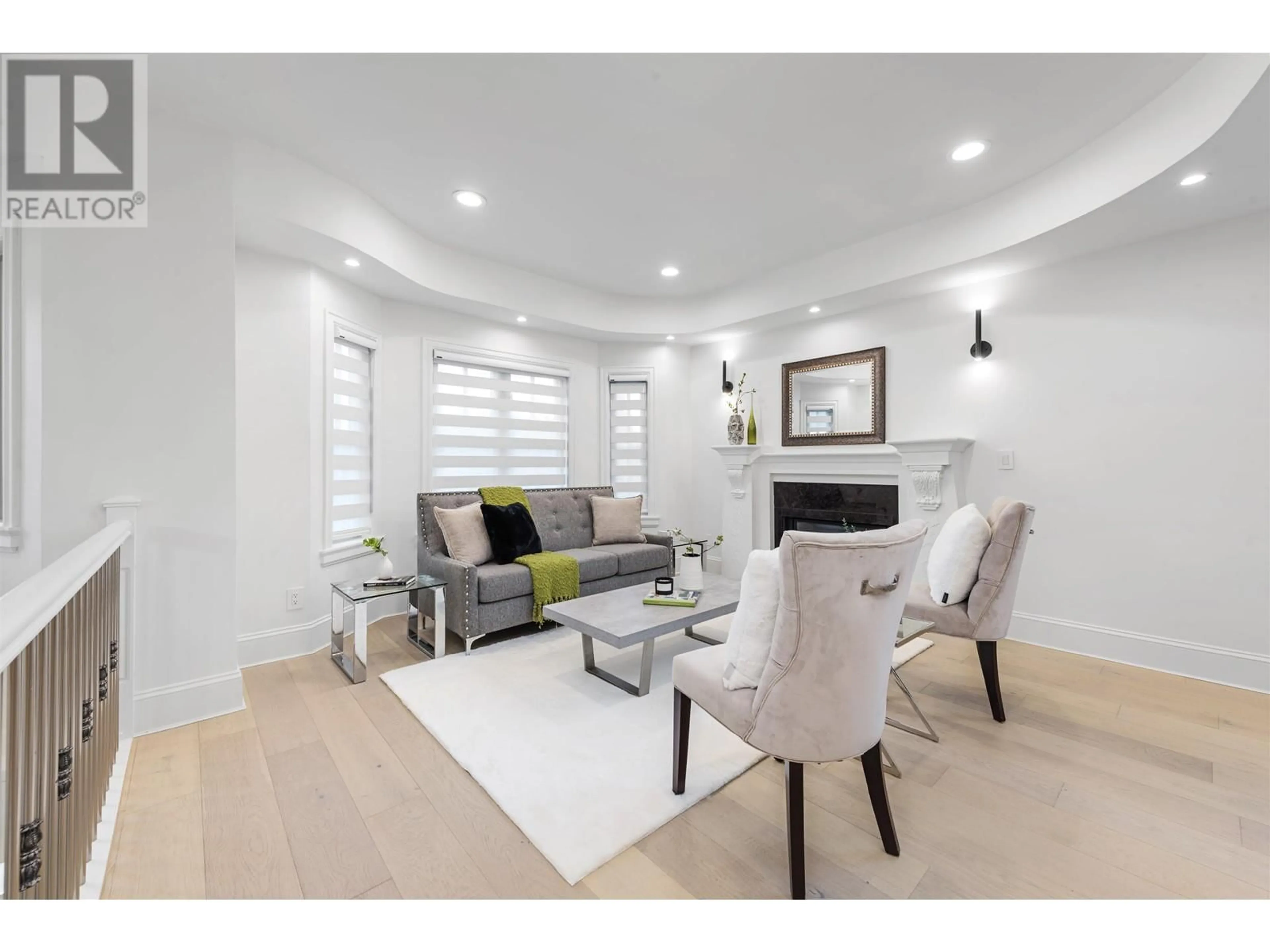 Living room with furniture, wood/laminate floor for 7778 NURSERY STREET, Burnaby British Columbia V5E2B4