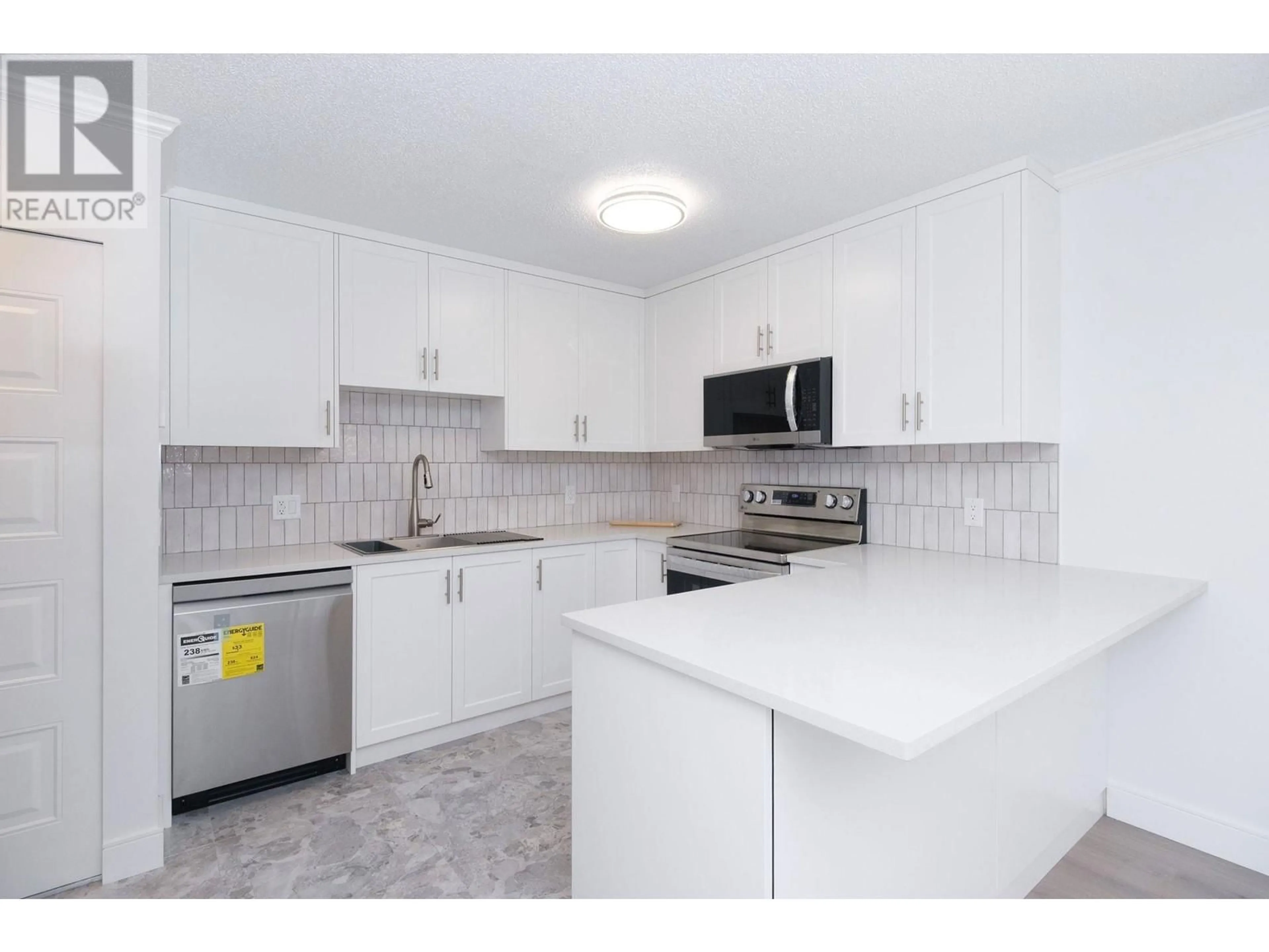 Standard kitchen, ceramic/tile floor for 2401 - 3970 CARRIGAN COURT, Burnaby British Columbia V3N4S5
