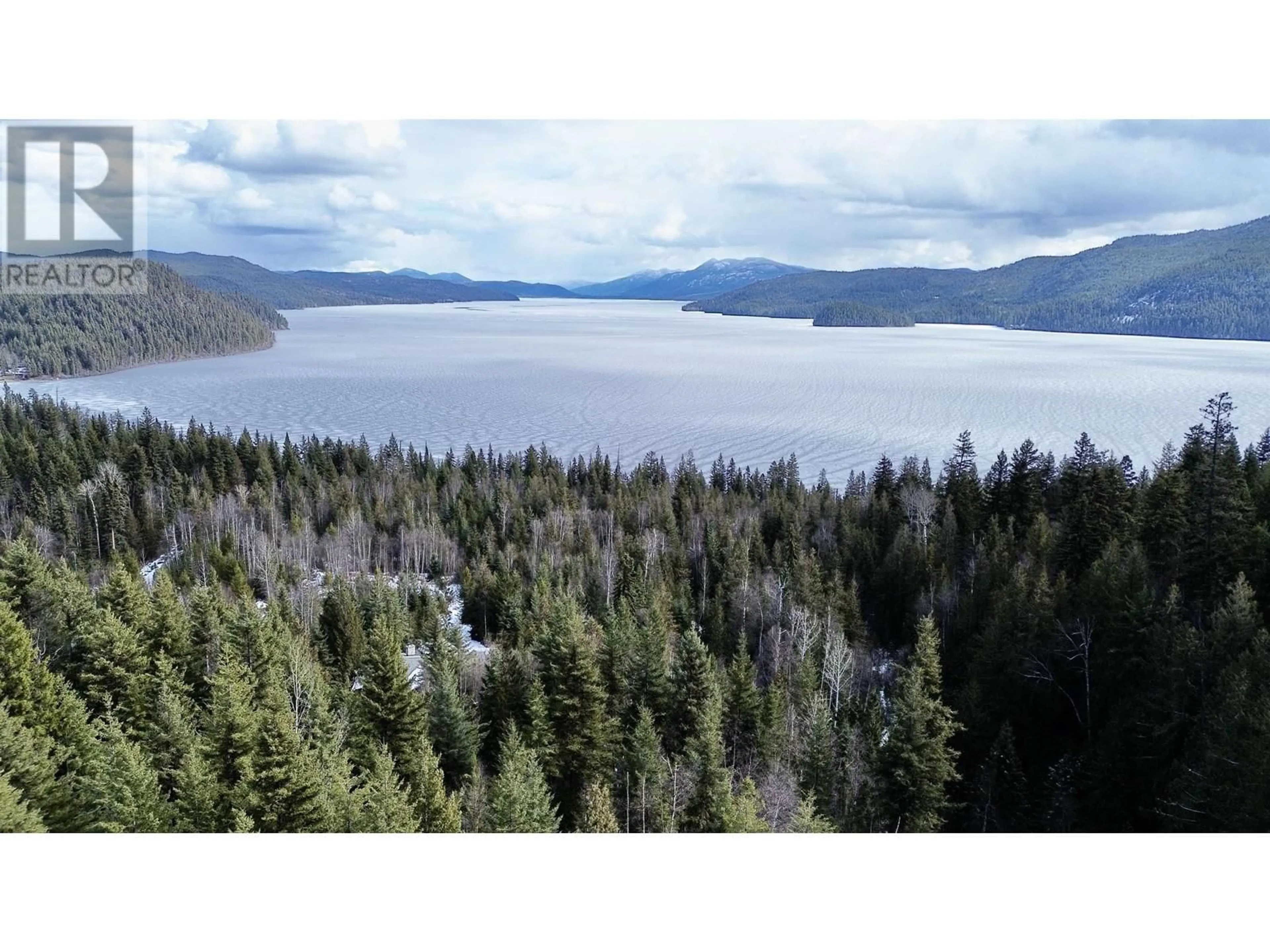 A pic from outside/outdoor area/front of a property/back of a property/a pic from drone, water/lake/river/ocean view for 3561 CANIM-HENDRIX LAKE ROAD, 100 Mile House British Columbia V0K1L0