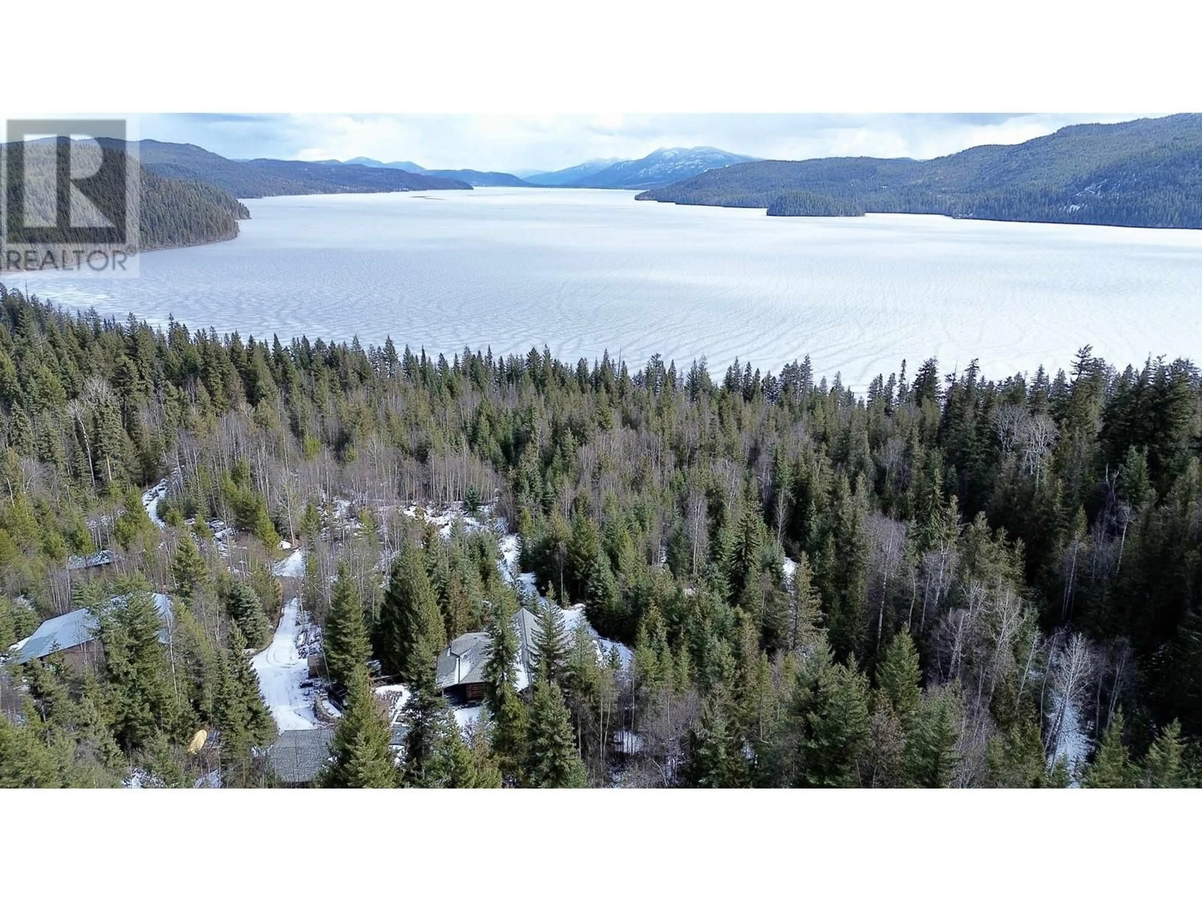 A pic from outside/outdoor area/front of a property/back of a property/a pic from drone, water/lake/river/ocean view for 3561 CANIM-HENDRIX LAKE ROAD, 100 Mile House British Columbia V0K1L0