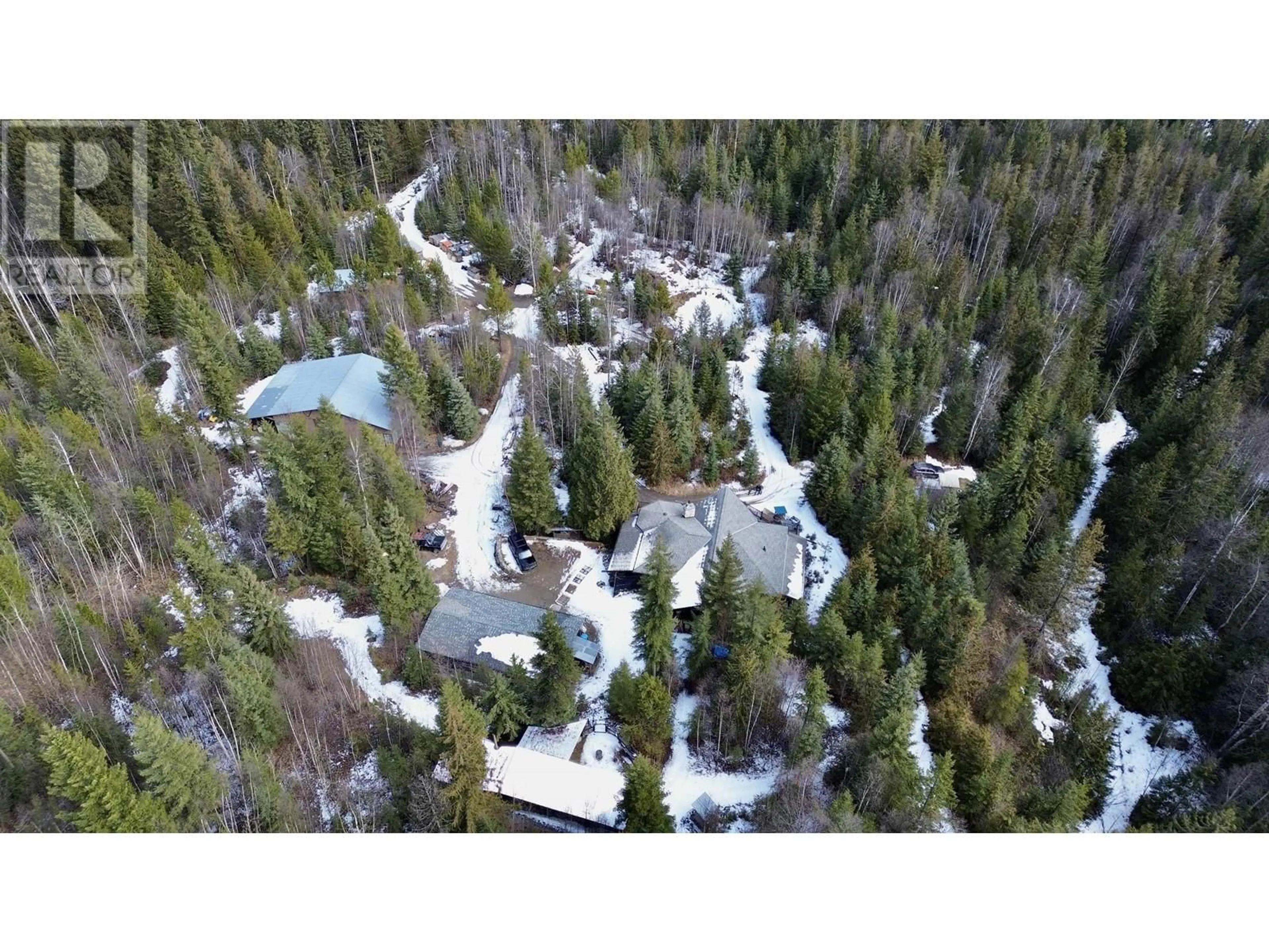 A pic from outside/outdoor area/front of a property/back of a property/a pic from drone, forest/trees view for 3561 CANIM-HENDRIX LAKE ROAD, 100 Mile House British Columbia V0K1L0