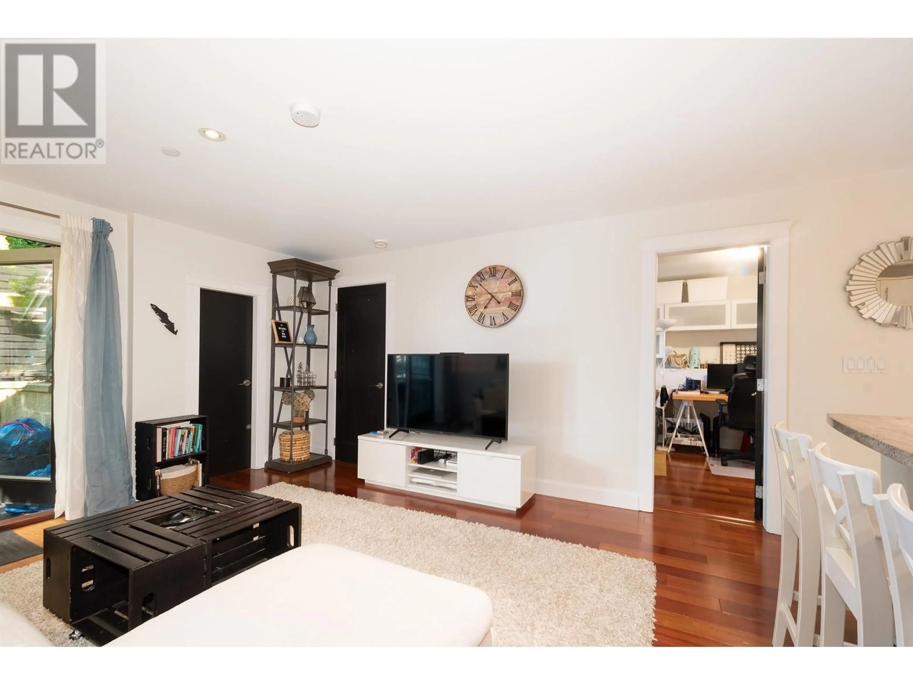 Living room with furniture, wood/laminate floor for 1931 7TH AVENUE, Vancouver British Columbia V5N1S3