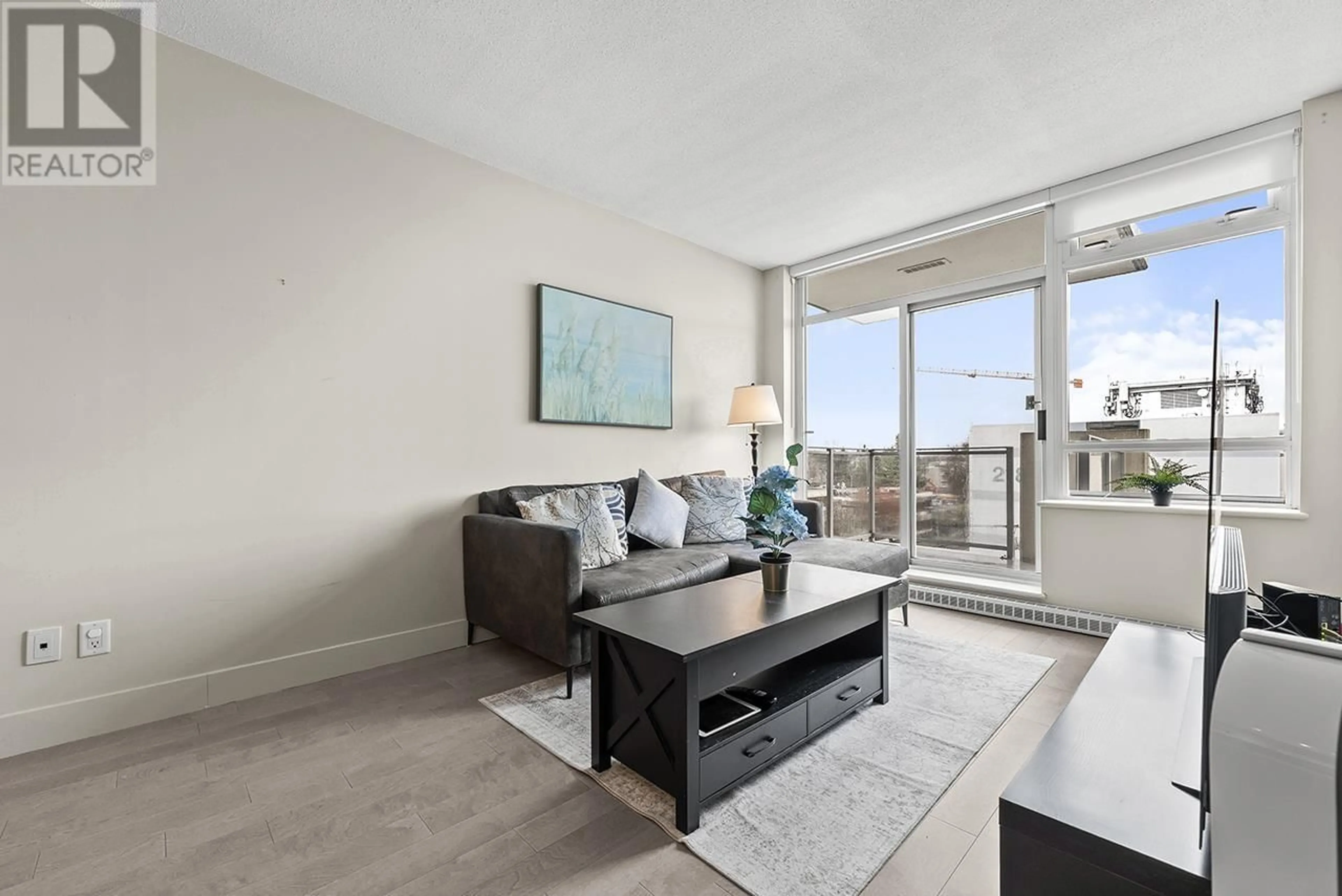 Living room with furniture, unknown for 703 - 2228 BROADWAY, Vancouver British Columbia V6K0B1