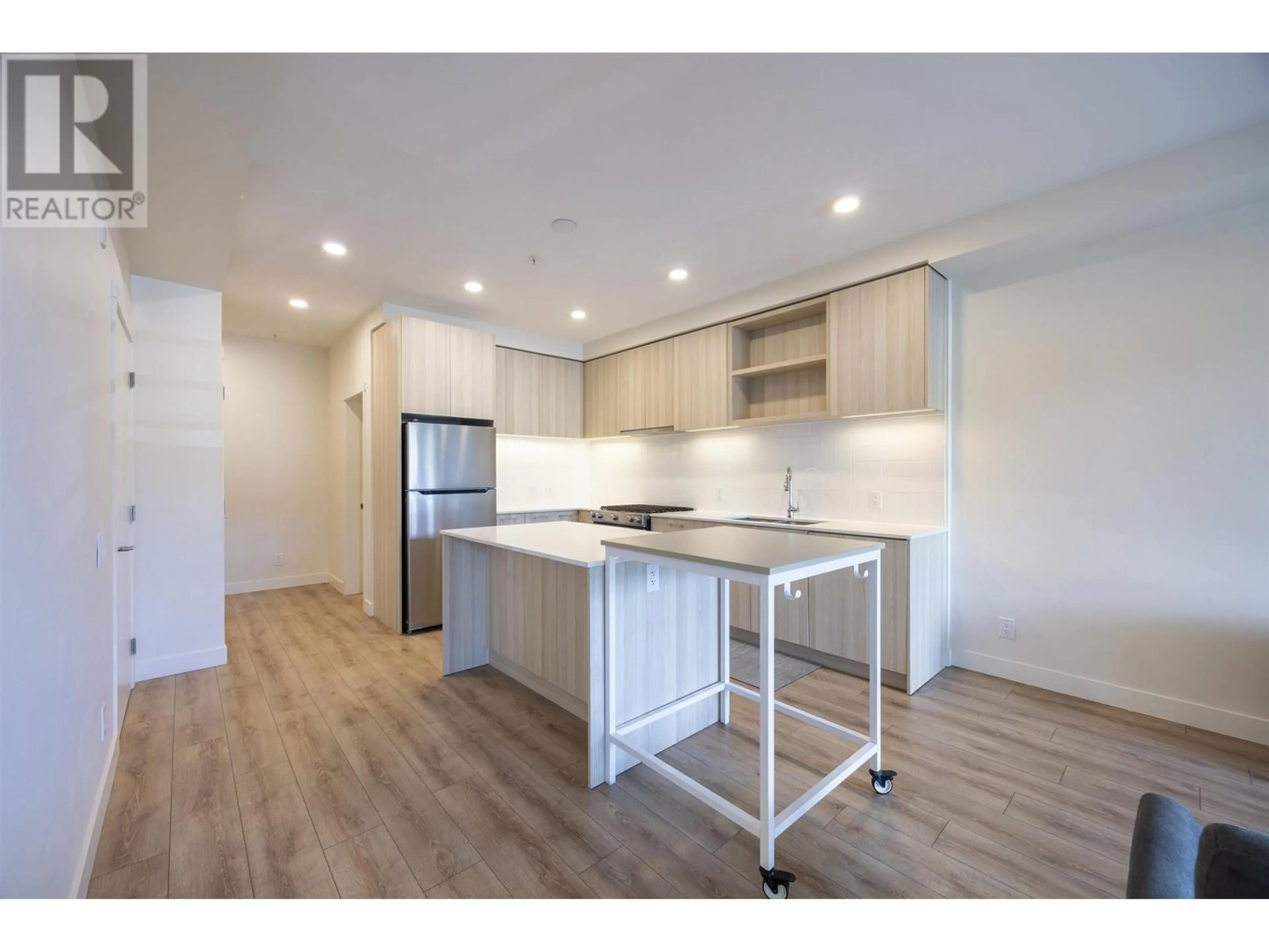 Open concept kitchen, wood/laminate floor for 213 - 721 ANSKAR CRESCENT, Coquitlam British Columbia V3J0L4