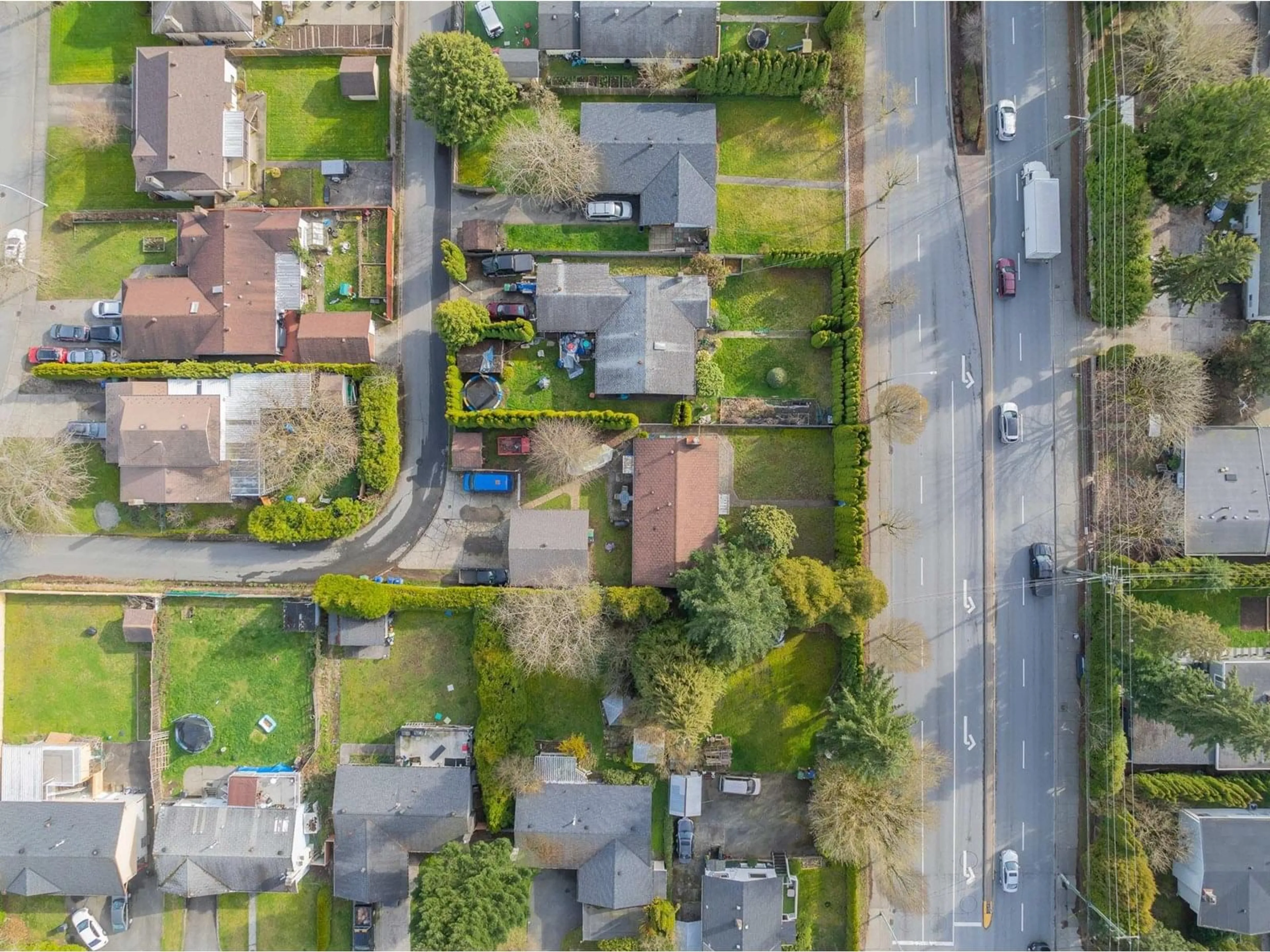 A pic from outside/outdoor area/front of a property/back of a property/a pic from drone, street for 8570 152, Surrey British Columbia V3S3N1