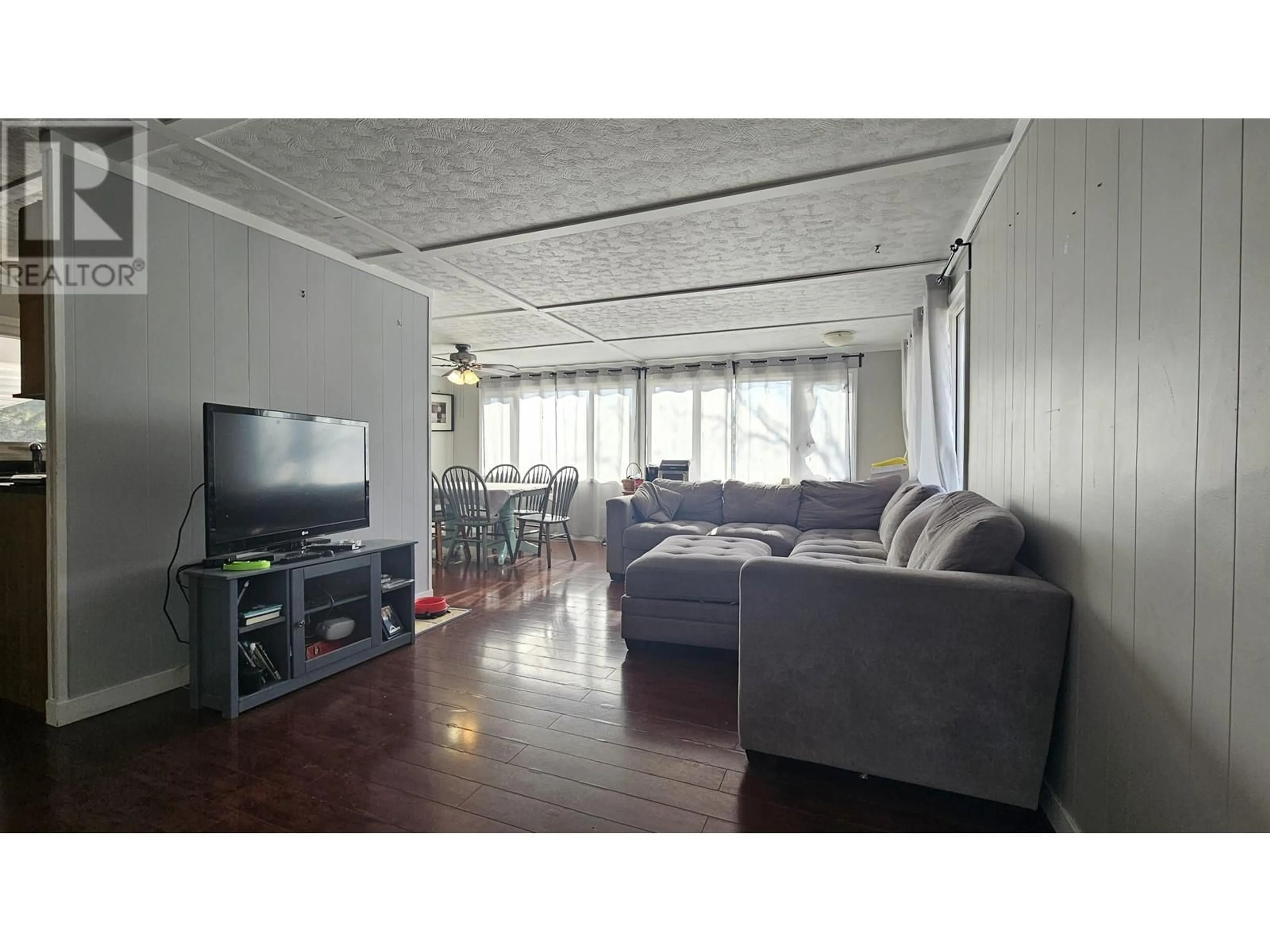 Living room with furniture, wood/laminate floor for 2274 BALL PLACE, Prince George British Columbia V2K3C6