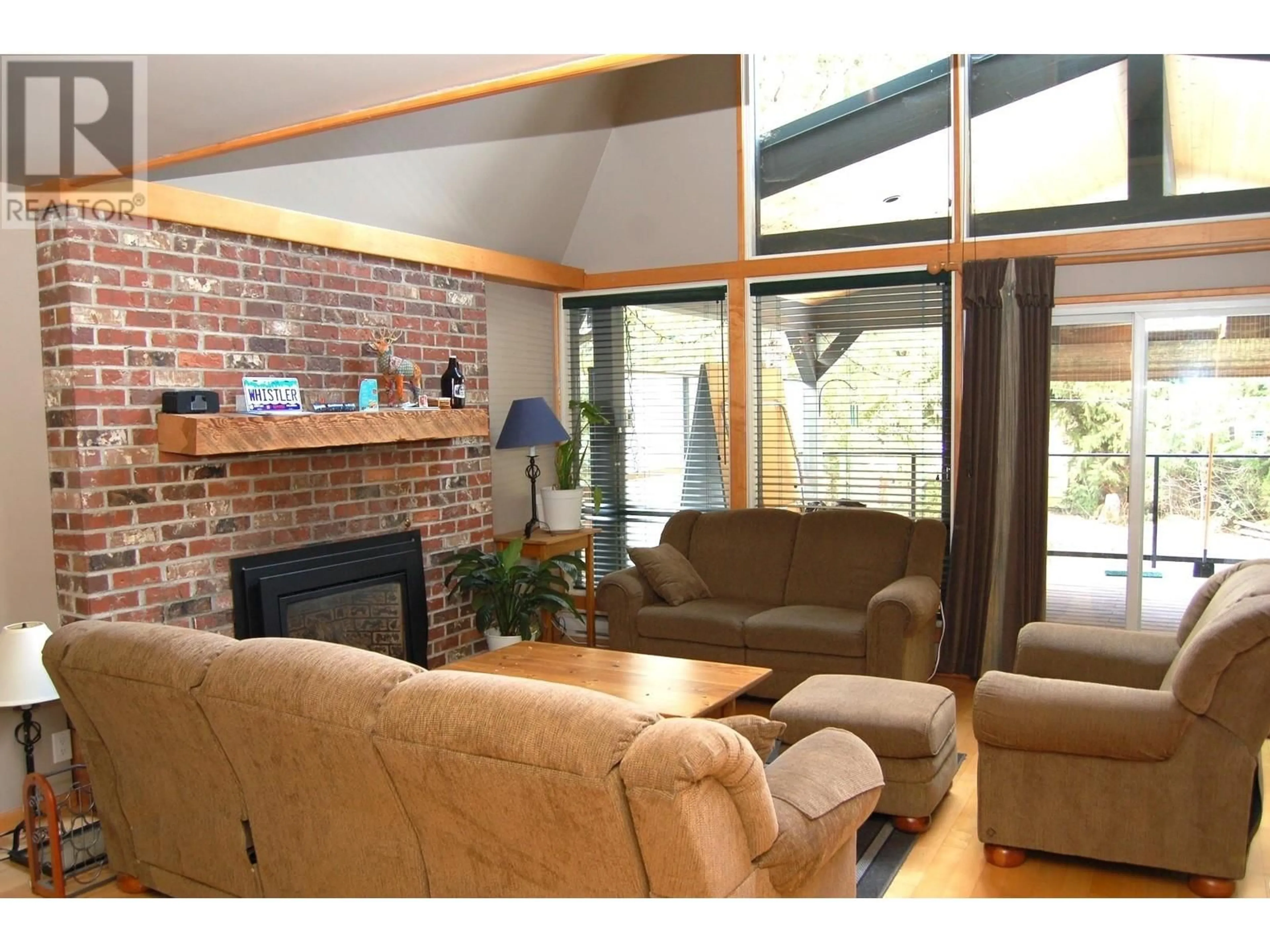 Living room with furniture, wood/laminate floor for 3366 LAKESIDE ROAD, Whistler British Columbia V8E0B8