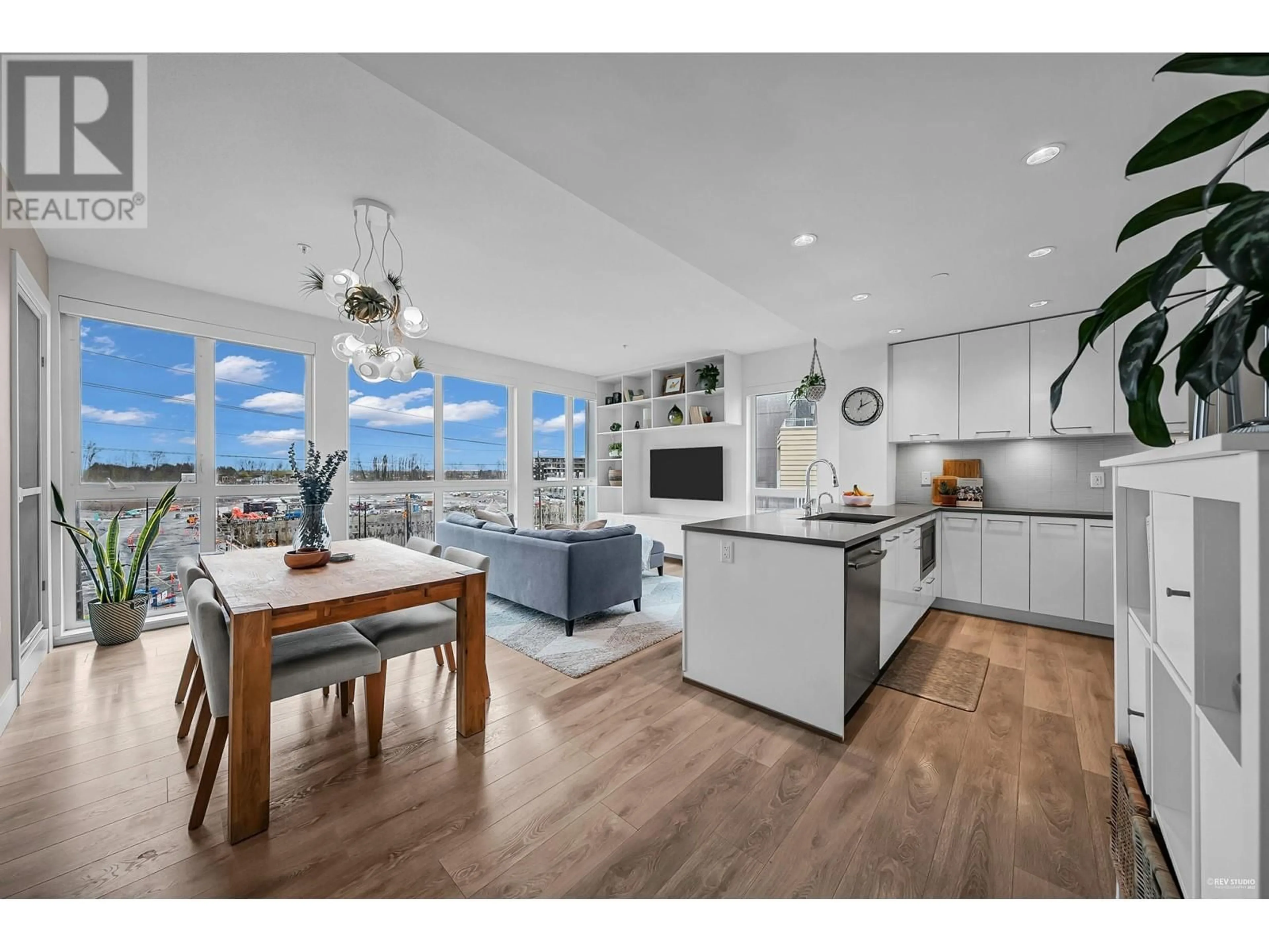Open concept kitchen, wood/laminate floor for 505 - 8580 RIVER DISTRICT CROSSING, Vancouver British Columbia V5S0B9