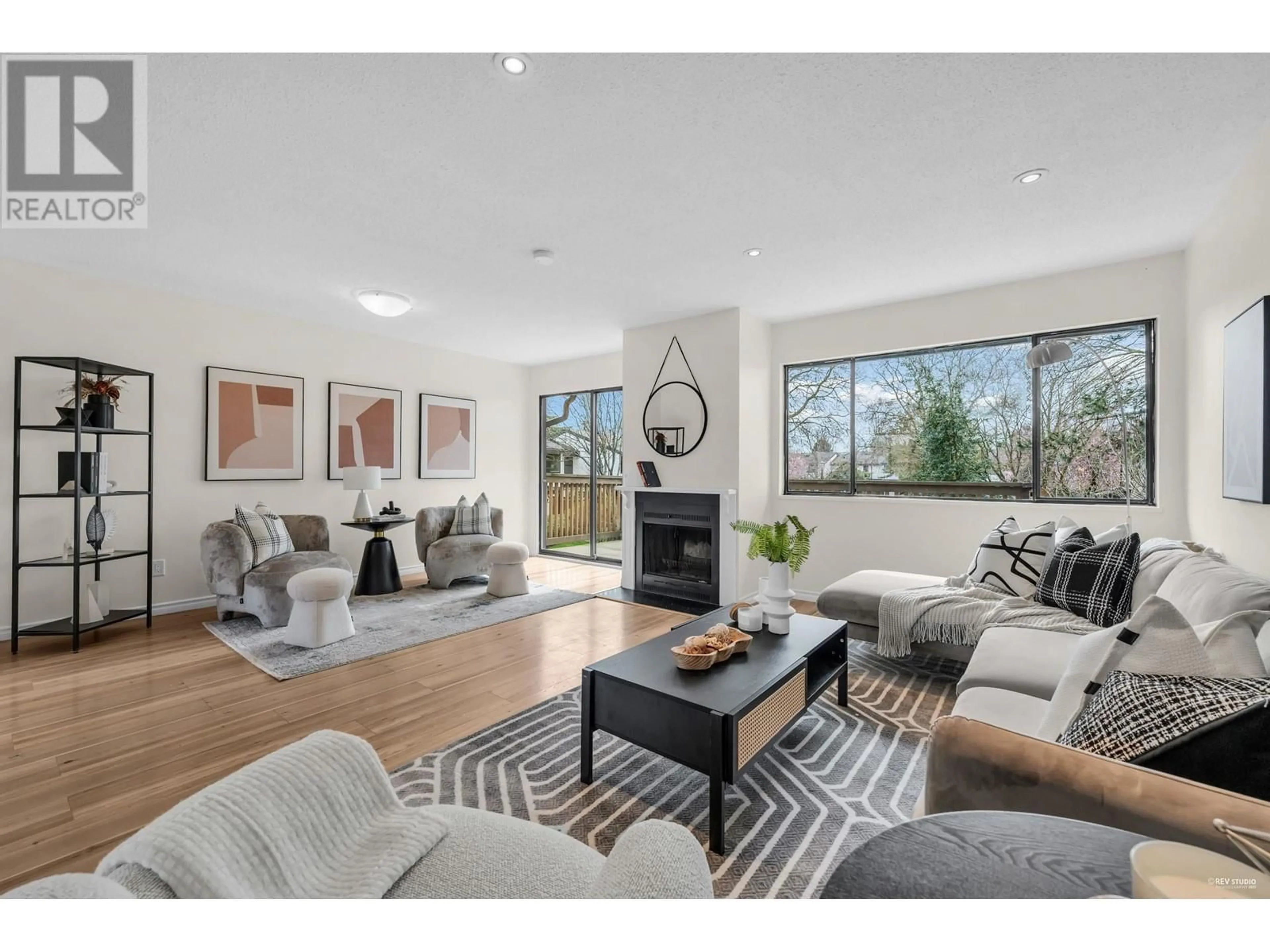 Living room with furniture, wood/laminate floor for 70 - 11491 7TH AVENUE, Richmond British Columbia V7E4J5