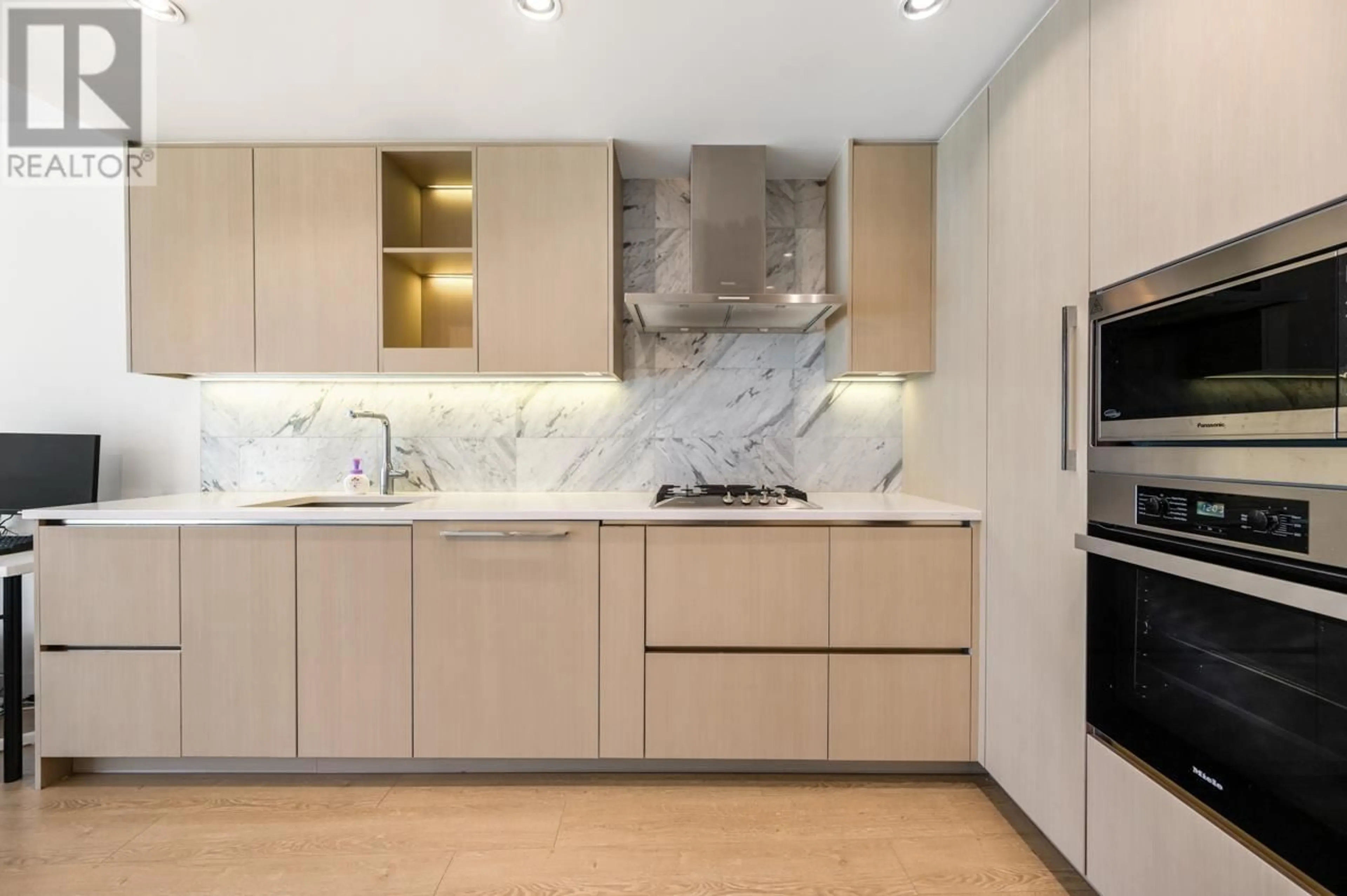 Contemporary kitchen, ceramic/tile floor for 412 - 89 NELSON STREET, Vancouver British Columbia V6Z0E7