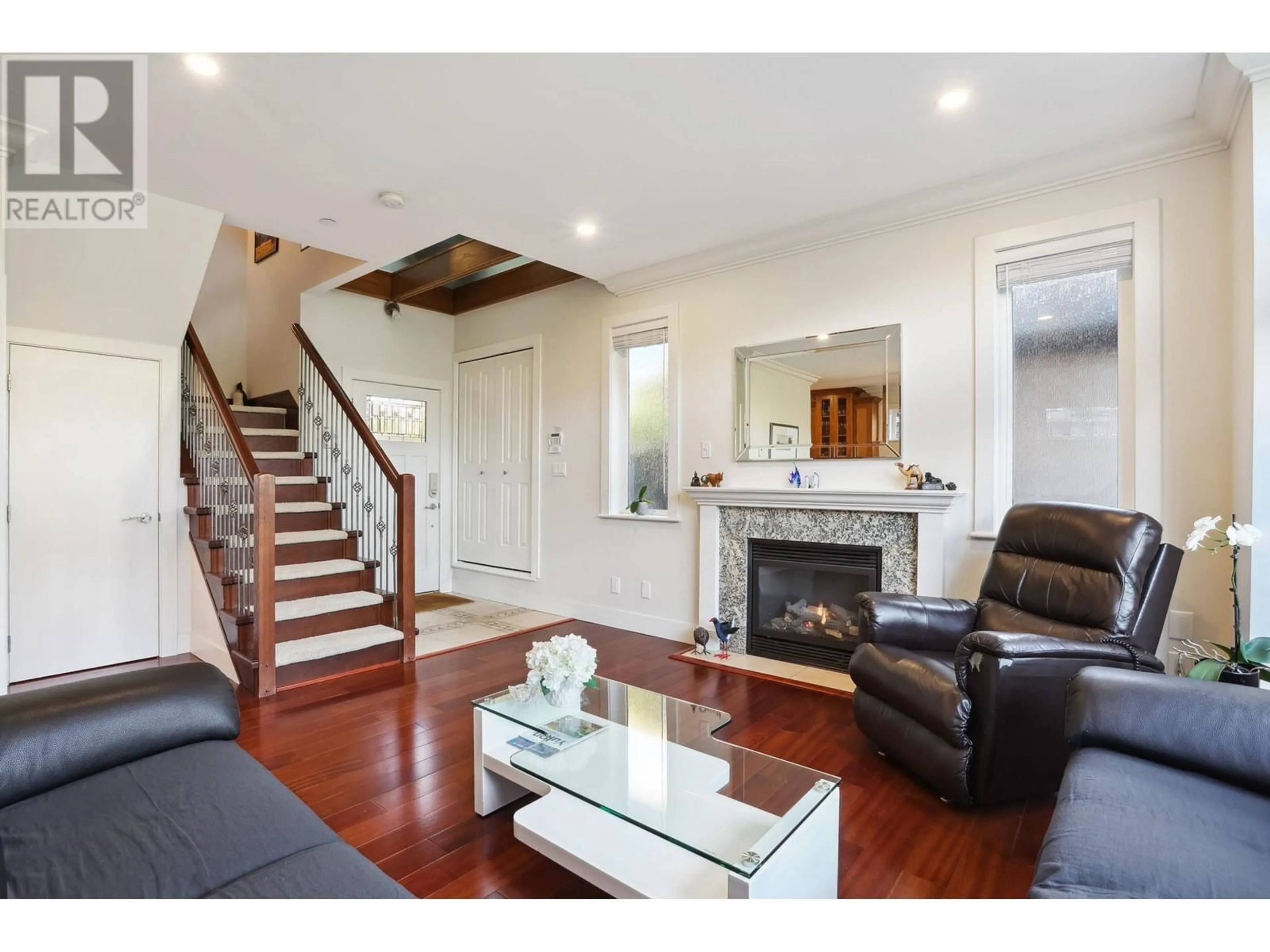 Living room with furniture, wood/laminate floor for 3487 2ND AVENUE, Vancouver British Columbia V6R1J3