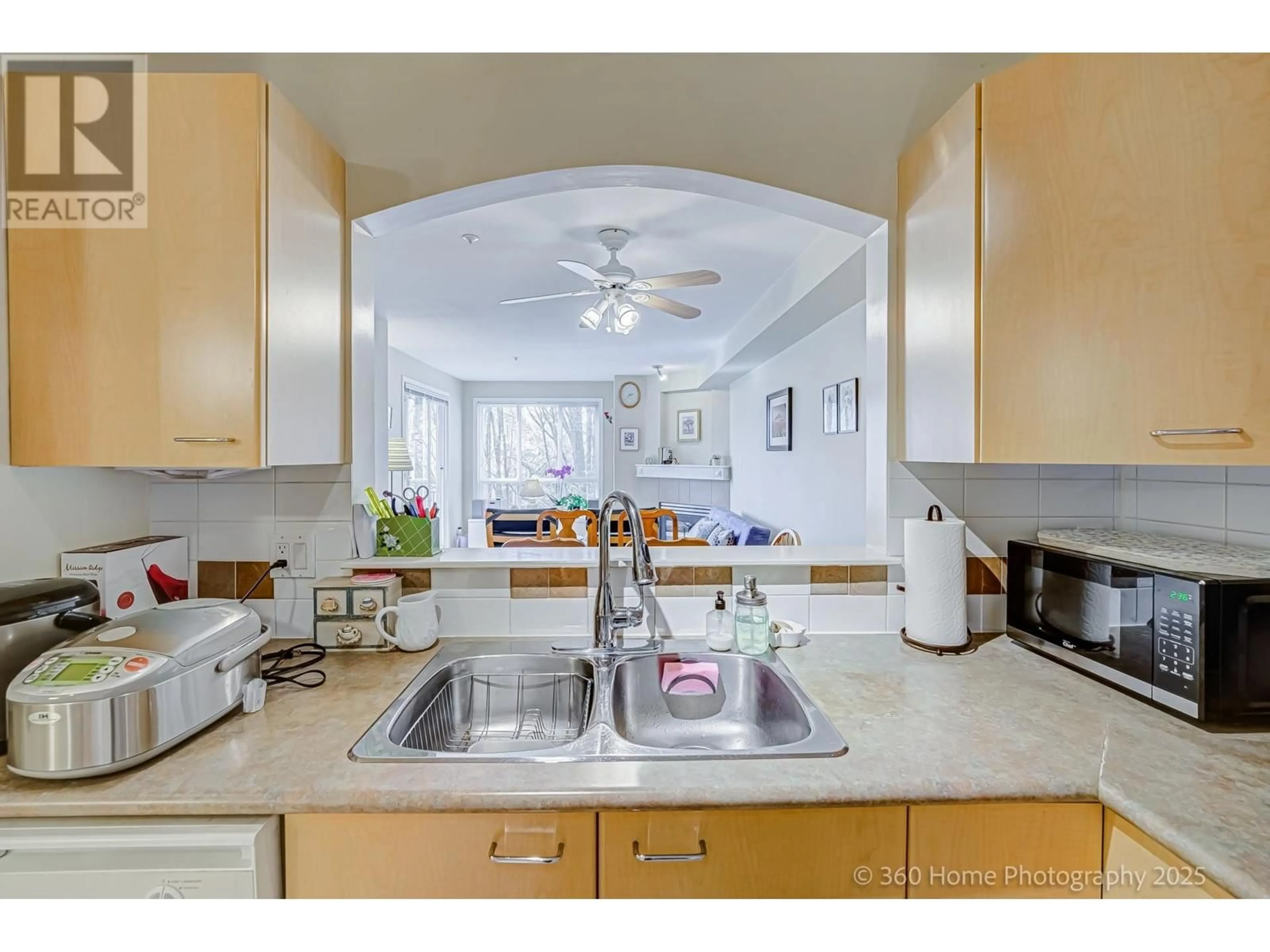 Standard kitchen, ceramic/tile floor for 307 - 8495 JELLICOE STREET, Vancouver British Columbia V5S2J4