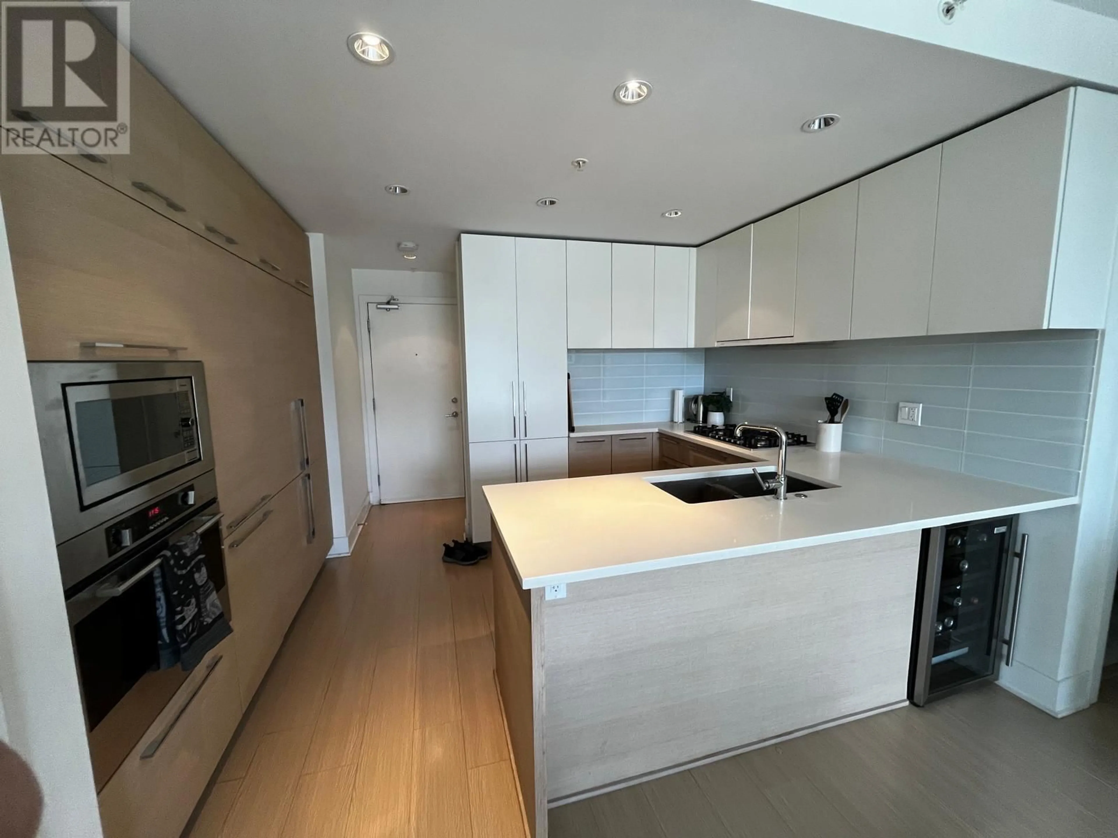 Open concept kitchen, unknown for 3805 - 1188 PINETREE WAY, Coquitlam British Columbia V3B0K9
