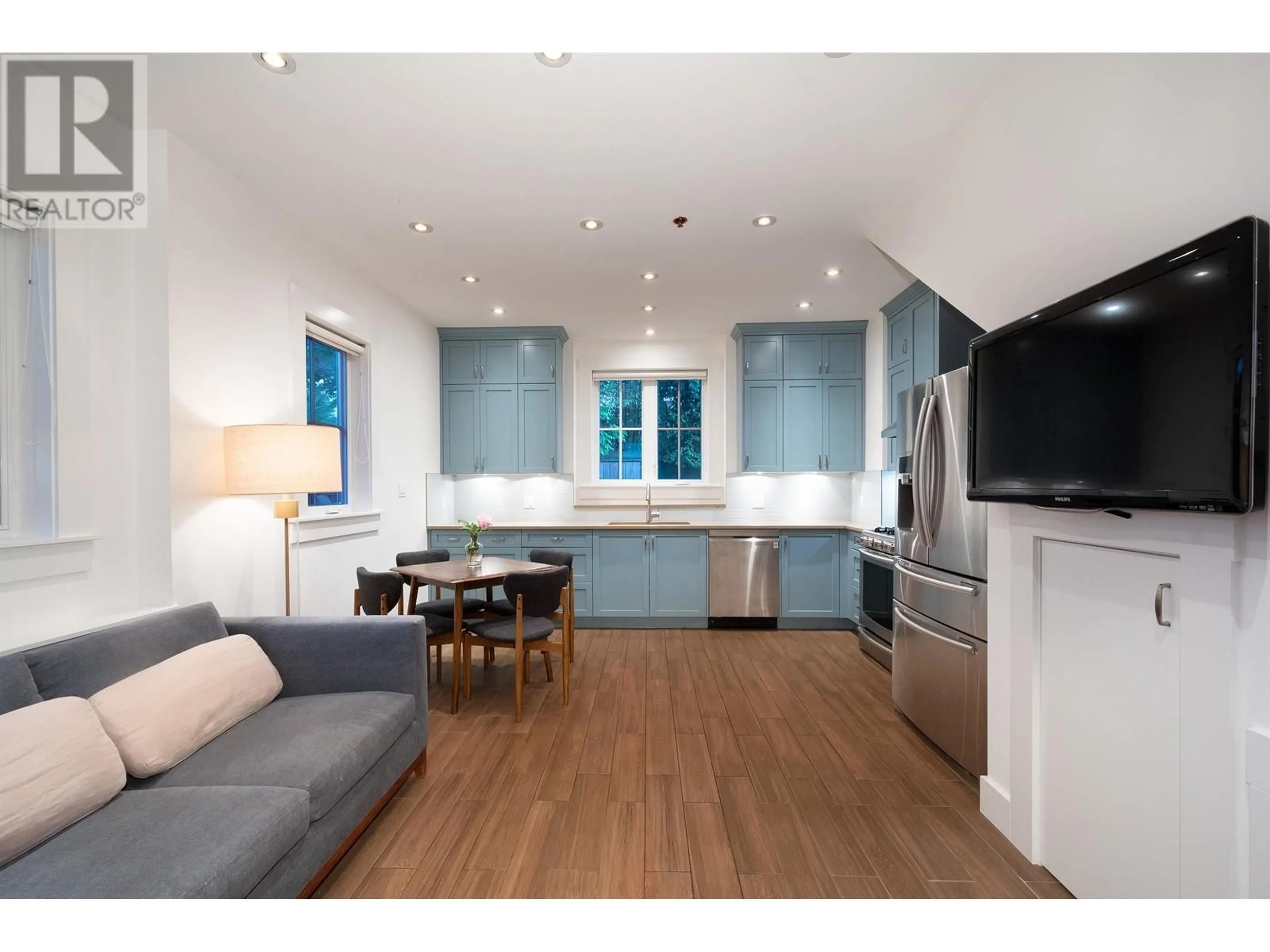 Open concept kitchen, wood/laminate floor for 3132 7TH AVENUE, Vancouver British Columbia V6K2A1