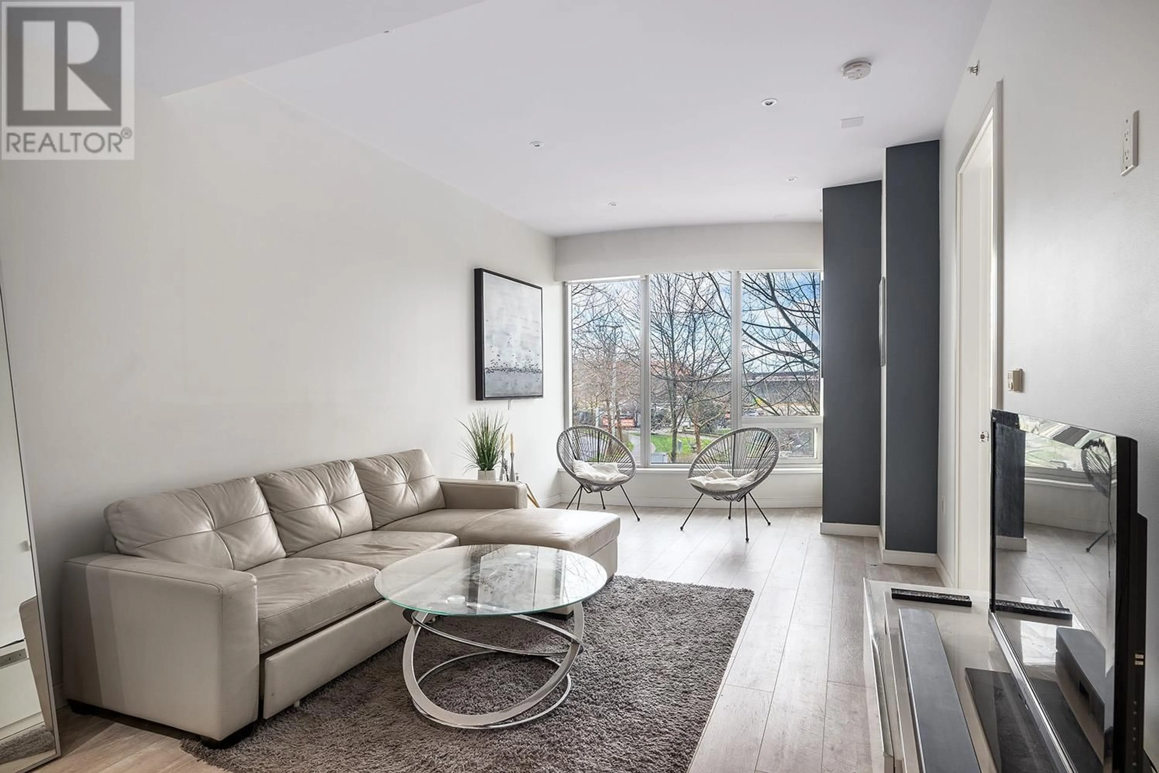 Living room with furniture, unknown for 203 - 181 1ST AVENUE, Vancouver British Columbia V5Y0E3