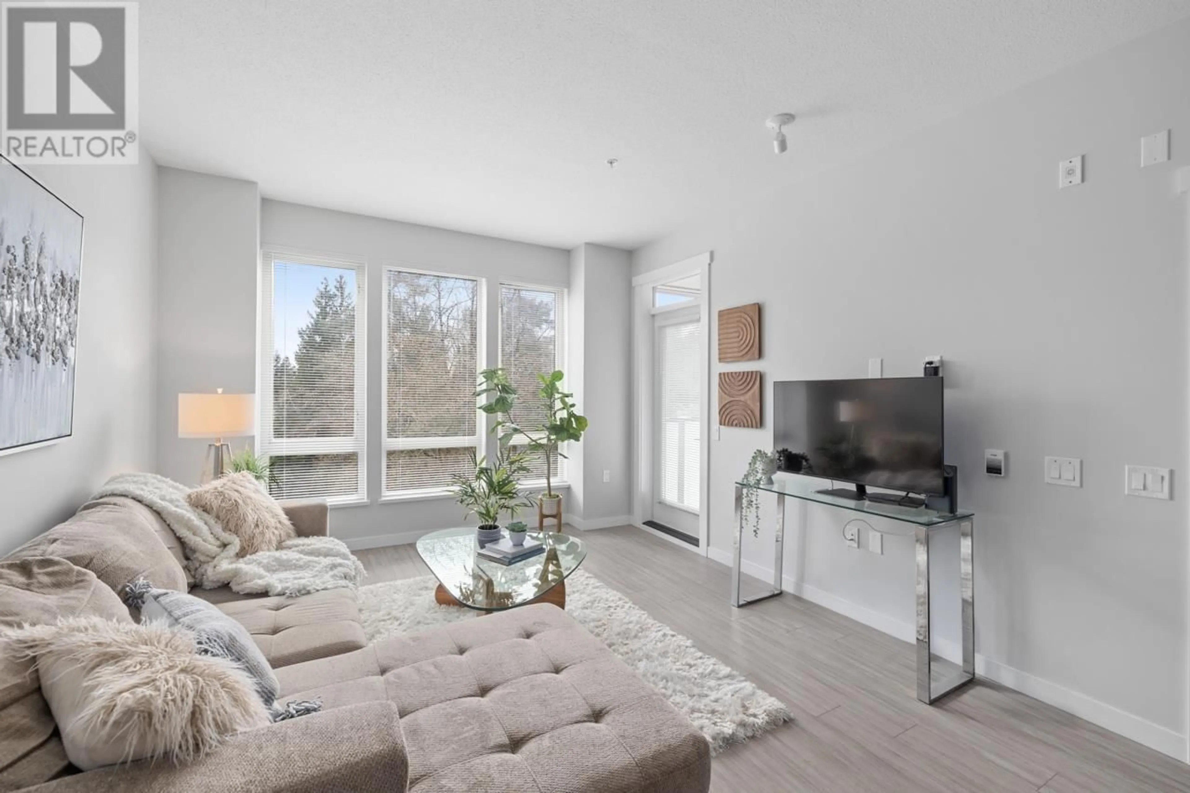 Living room with furniture, unknown for 410 - 2632 LIBRARY LANE, North Vancouver British Columbia V7J0B8