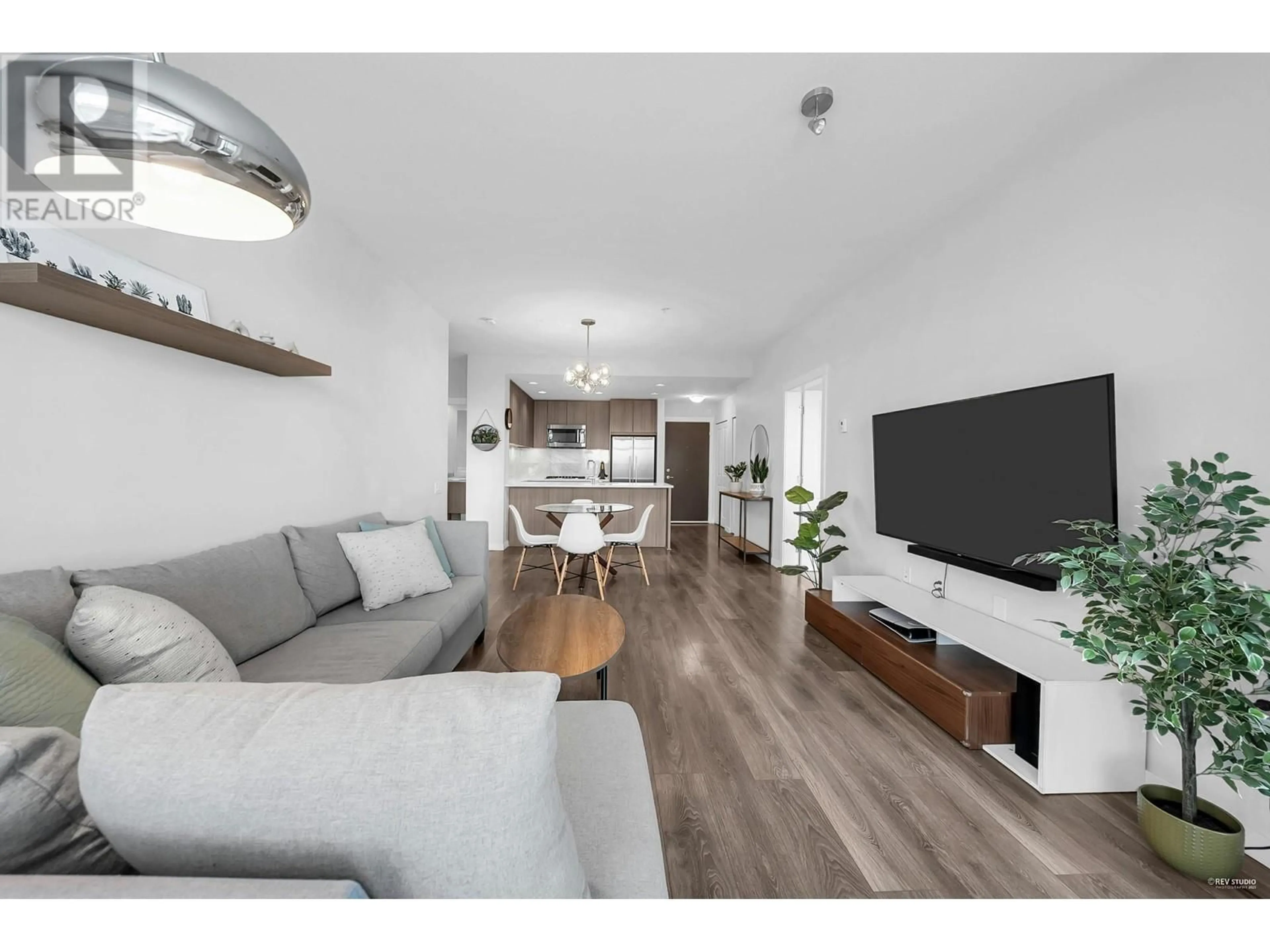 Living room with furniture, wood/laminate floor for 403 - 3289 RIVERWALK AVENUE, Vancouver British Columbia V5S0G2