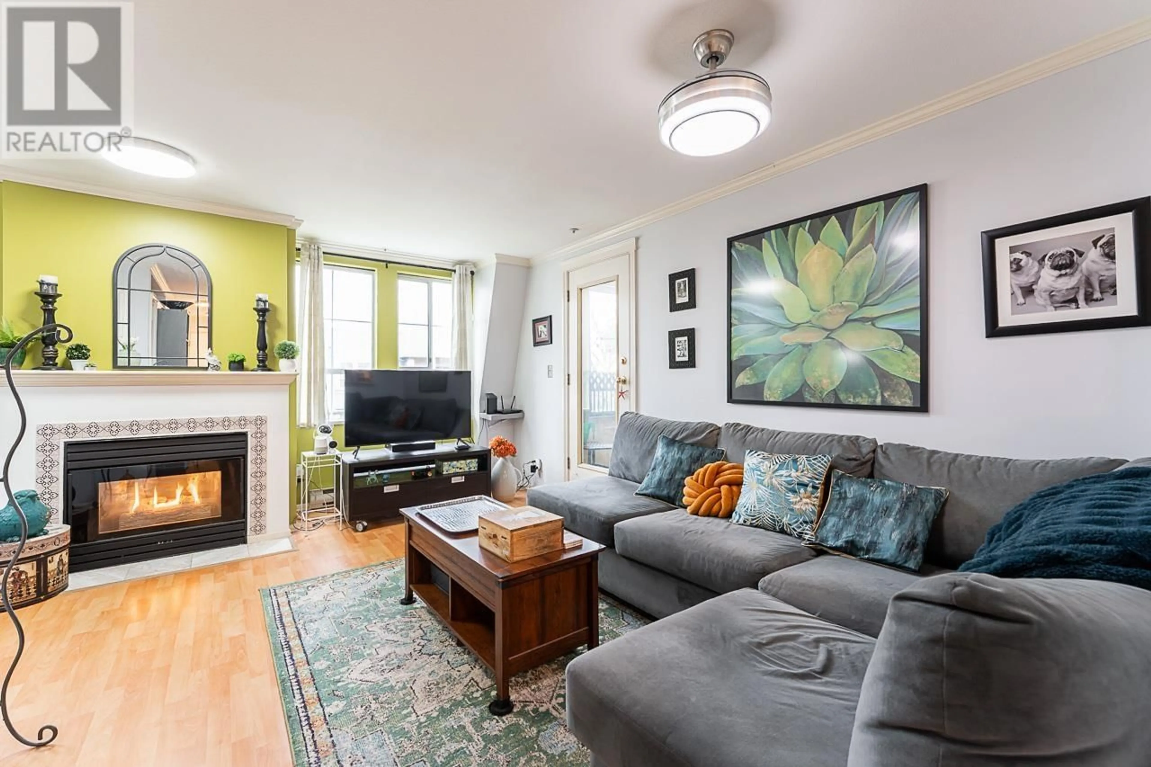 Living room with furniture, wood/laminate floor for 321 - 295 SCHOOLHOUSE STREET, Coquitlam British Columbia V3K6X5